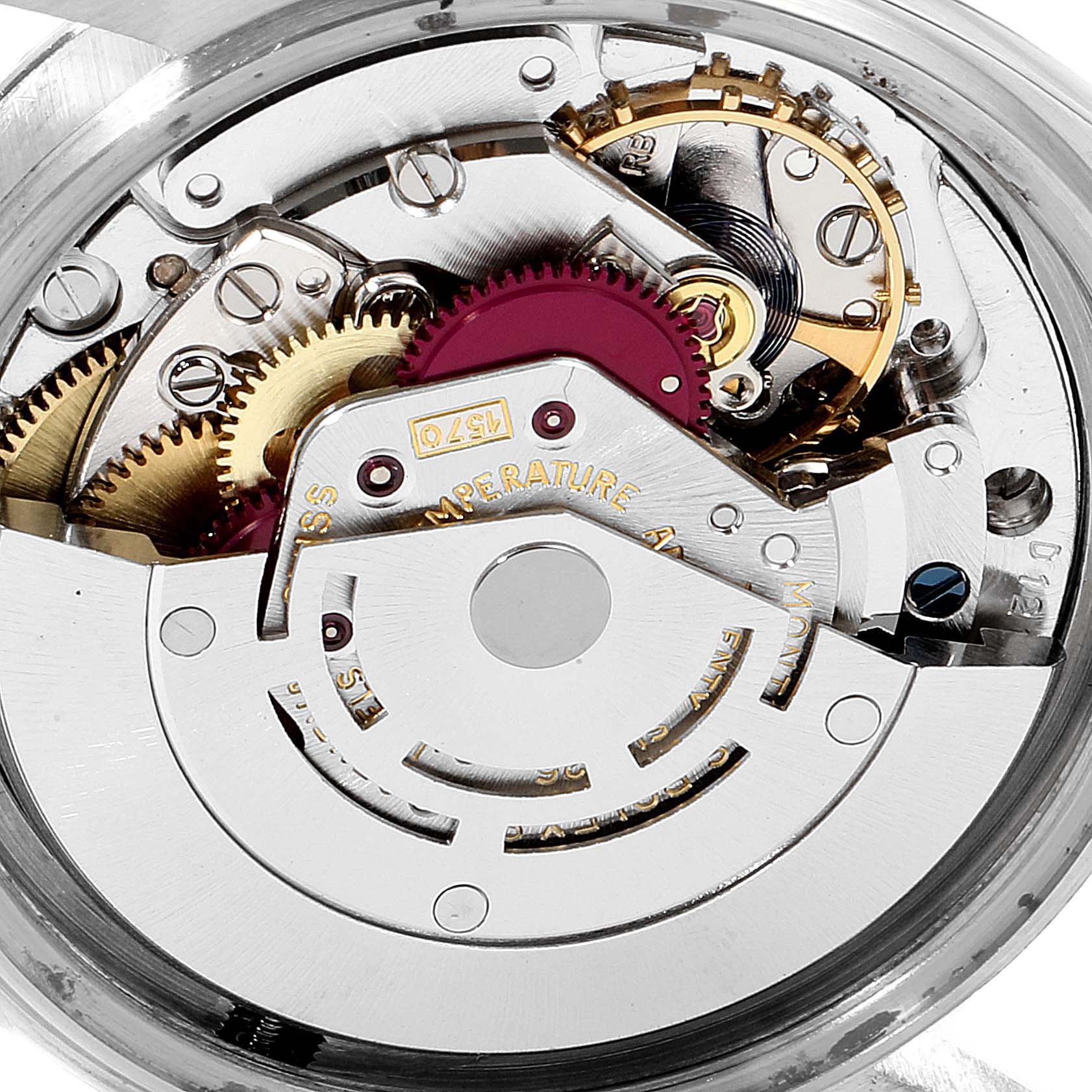 The image shows the inner mechanism and movement parts of a Vintage Collection model by Rolex from a close-up angle.