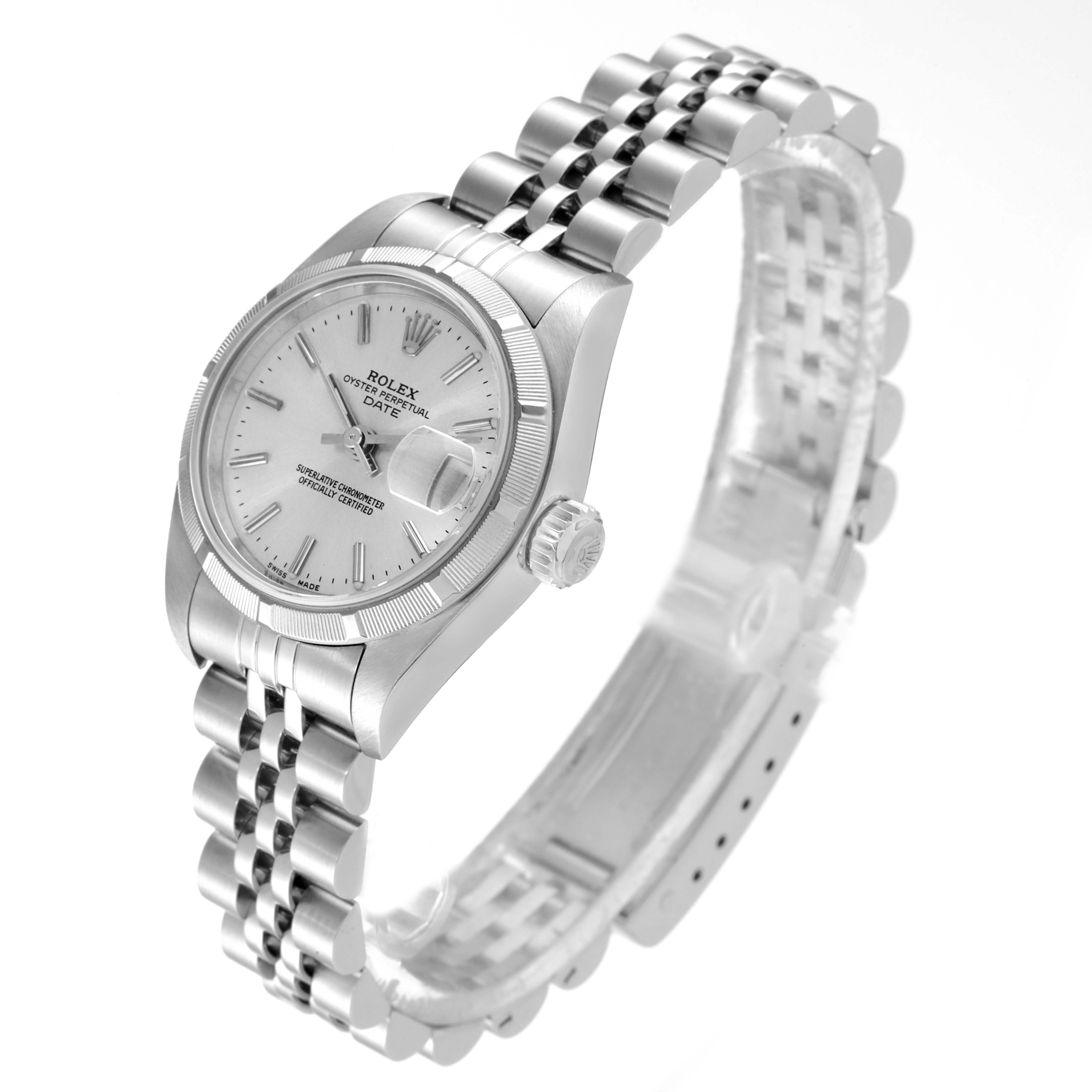 The image shows a Rolex Date 79190 Women's Stainless Steel Silver Dial 79190 Women's Stainless Steel Silver Dial model at a side angle, highlighting the face, bezel, crown, and partially clasped bracelet.