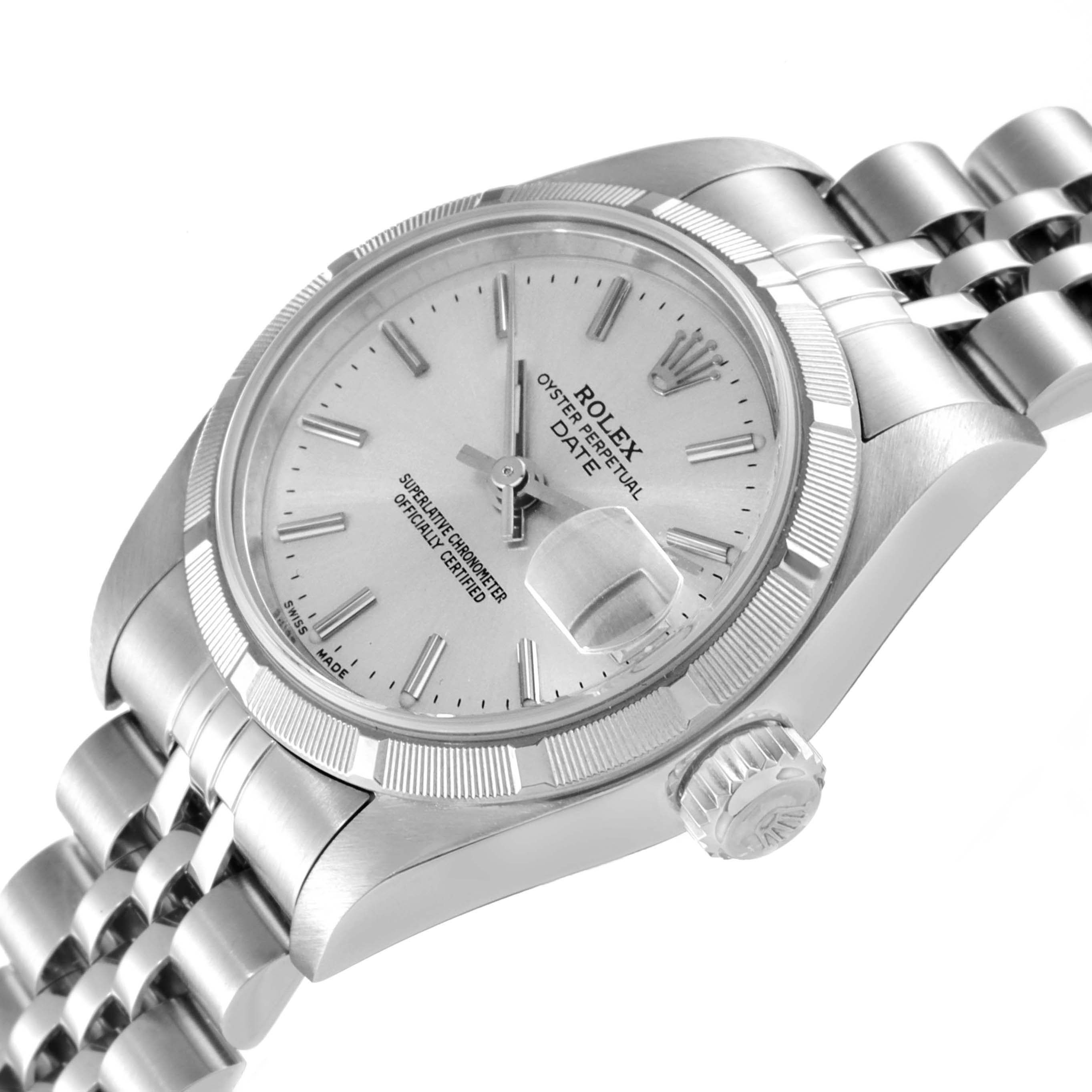 This image shows a side angle of a Rolex Date 79190 Women's Stainless Steel Silver Dial 79190 Women's Stainless Steel Silver Dial model, highlighting the dial, bezel, crown, and part of the bracelet.