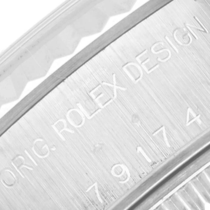 This image shows a close-up of the caseback engraving on a Rolex Datejust 79174 Women's Stainless Steel White Dial 79174 Women's Stainless Steel White Dial watch.
