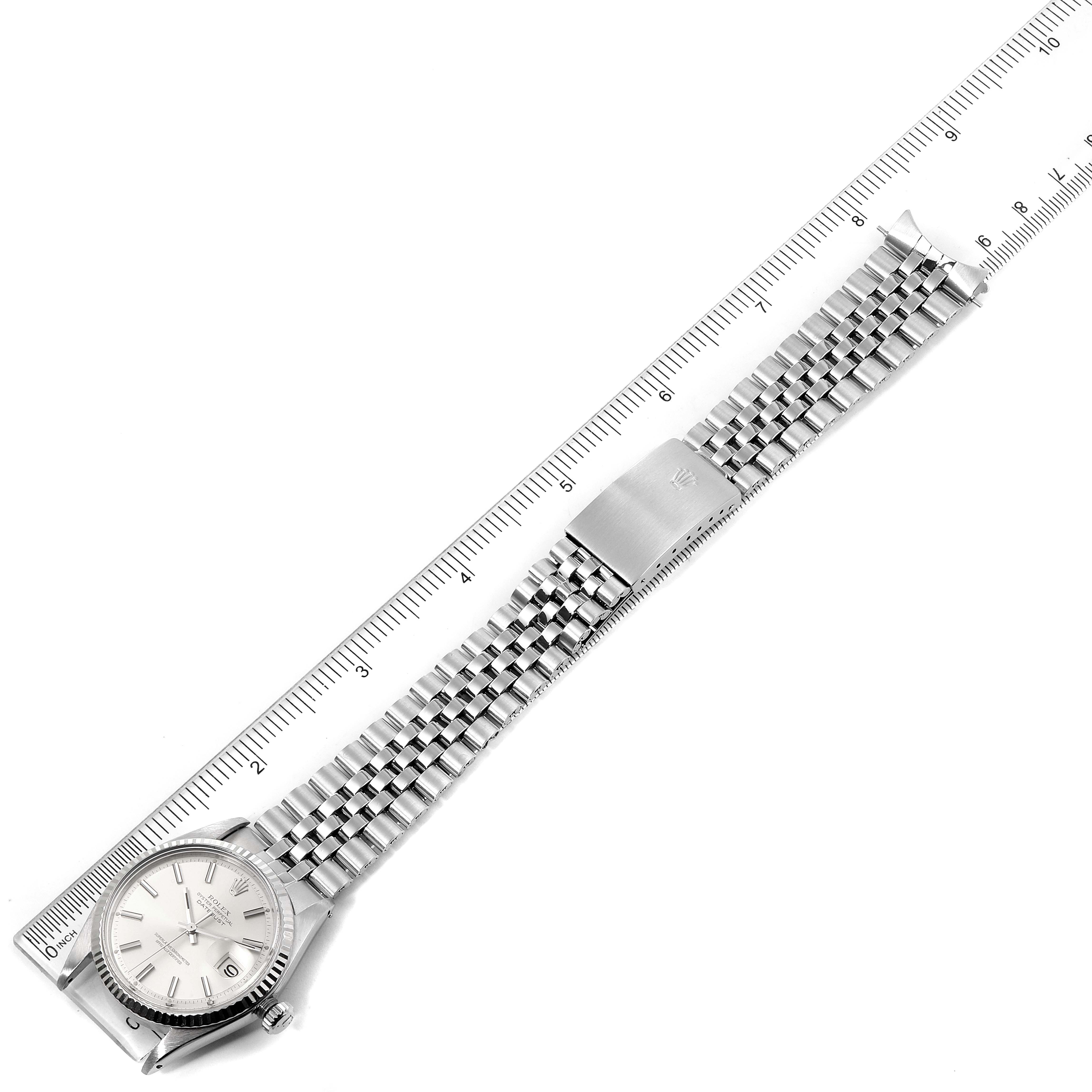 The Rolex Vintage Collection 1601 Men's Stainless Steel Silver Dial 1601 Men's Stainless Steel Silver Dial model is shown in a top-down view, highlighting its dial, bracelet, and clasp.