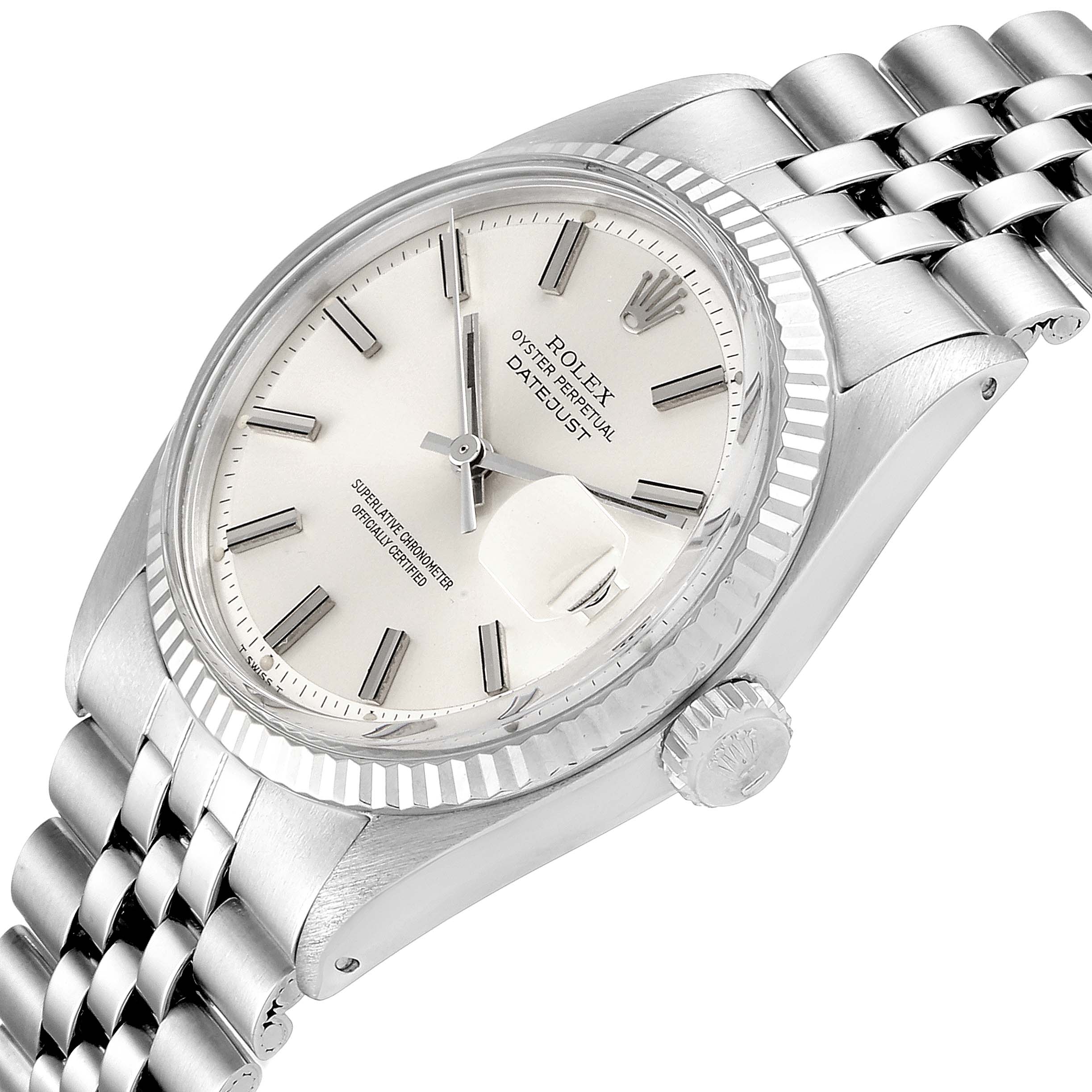 The image shows a close-up of the Rolex Vintage Collection 1601 Men's Stainless Steel Silver Dial 1601 Men's Stainless Steel Silver Dial Oyster Perpetual Datejust watch, displaying the dial, crown, and part of the bracelet.