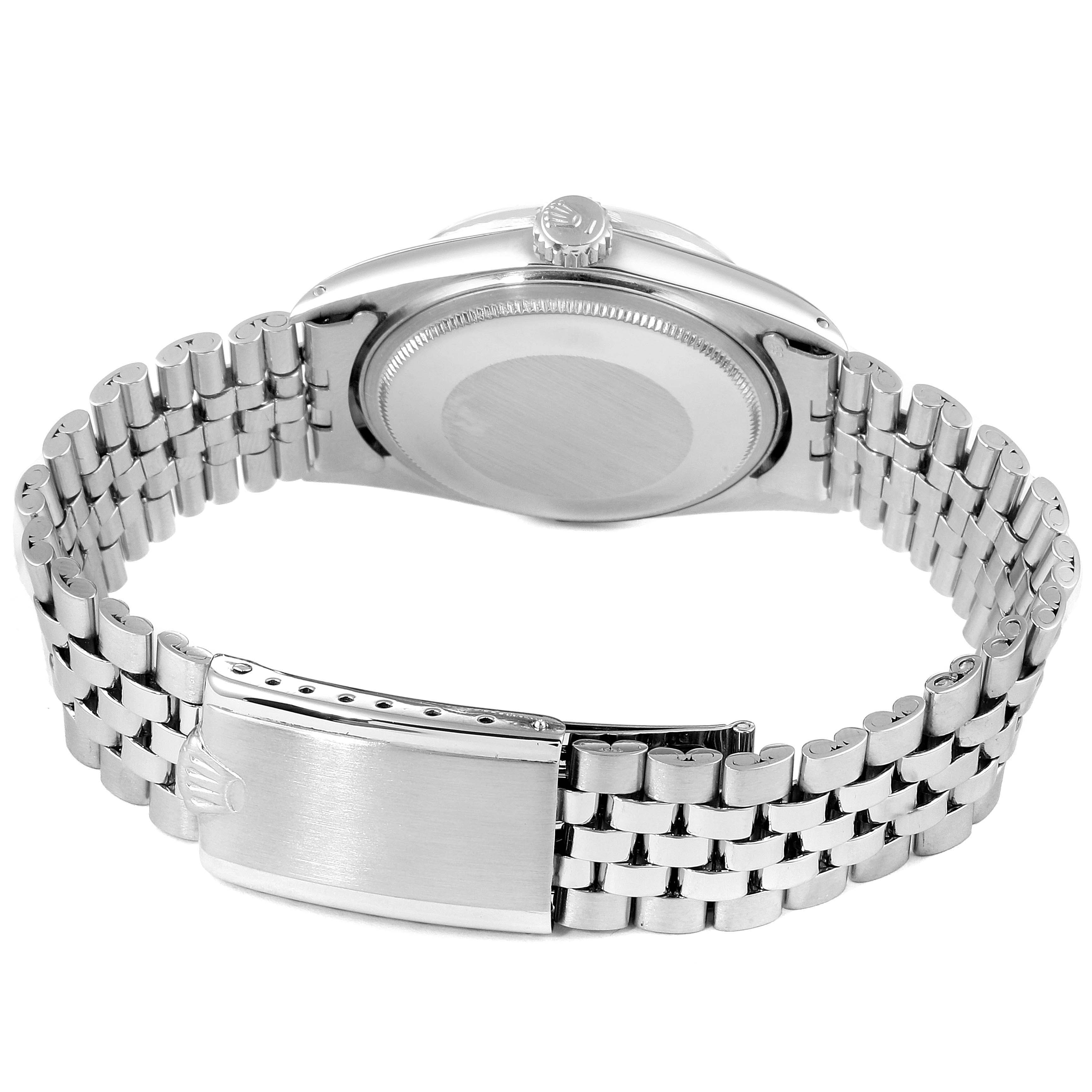 The image shows the back view of a Rolex Vintage Collection 1601 Men's Stainless Steel Silver Dial 1601 Men's Stainless Steel Silver Dial model, highlighting the case back, bracelet, and clasp.