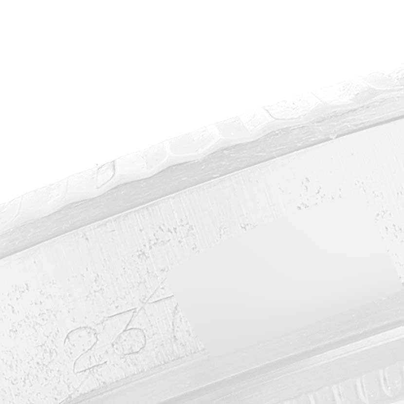 This image shows the side profile of the bezel and part of the casing of the Rolex Vintage Collection 1601 Men's Stainless Steel Silver Dial 1601 Men's Stainless Steel Silver Dial watch.