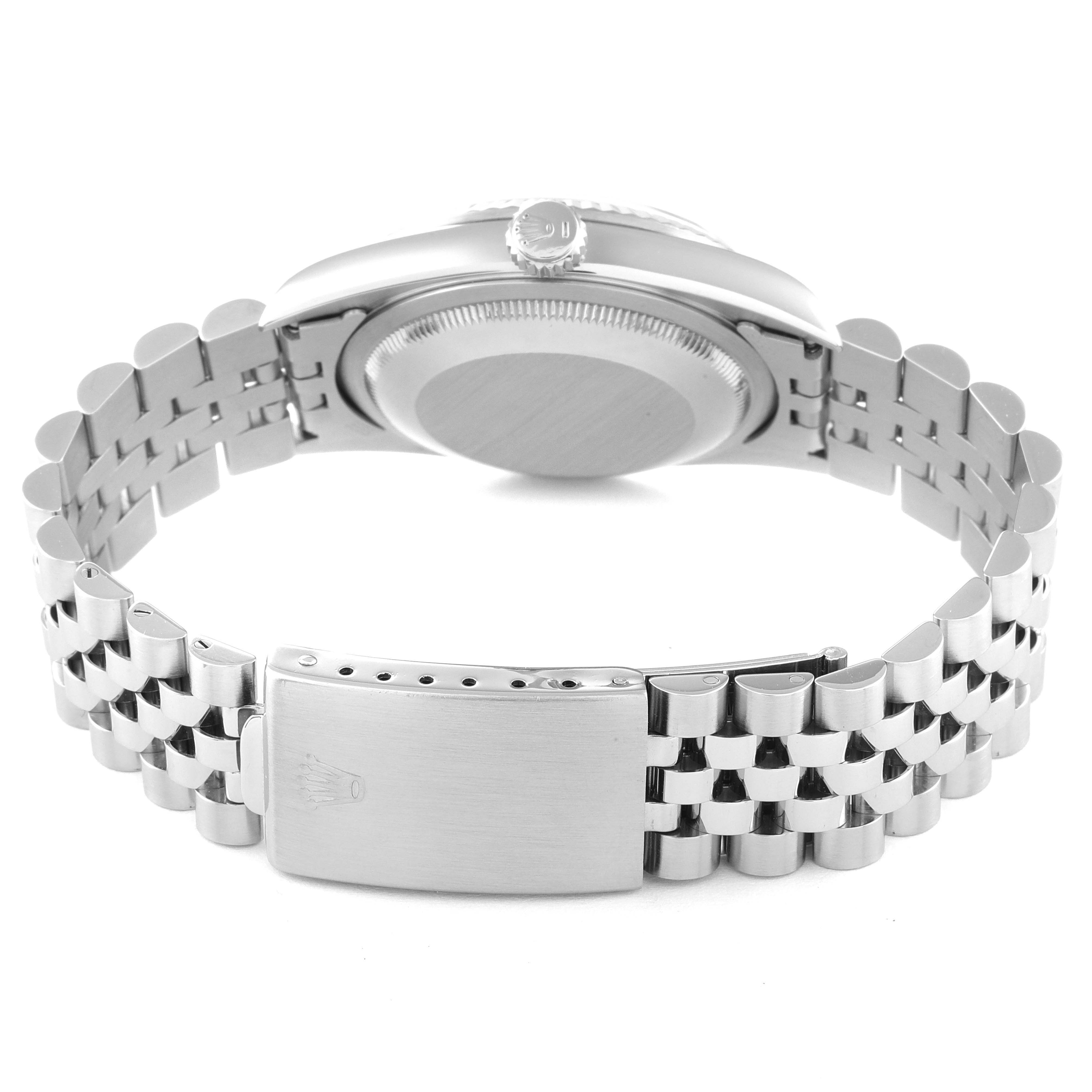 This is a rear view of the Rolex Datejust 16234 Men's Stainless Steel Silver Dial 16234 Men's Stainless Steel Silver Dial model showing the case back and Jubilee bracelet with the clasp.