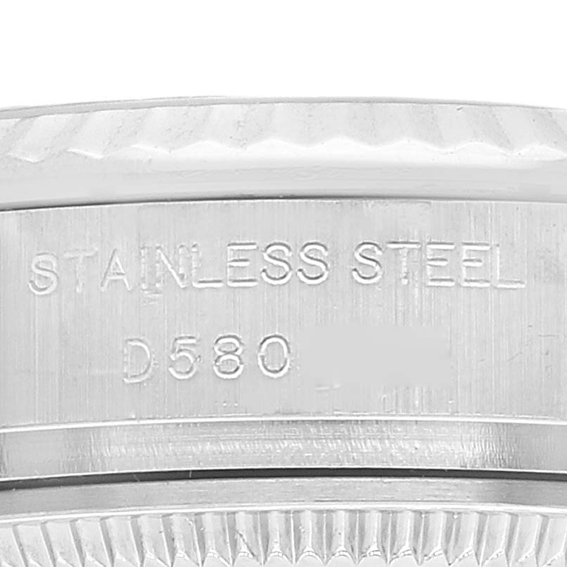 The image shows an engraved side view of the Rolex Datejust 179174 Women's Stainless Steel Silver Dial 179174 Women's Stainless Steel Silver Dial model, highlighting the stainless steel construction and serial number.
