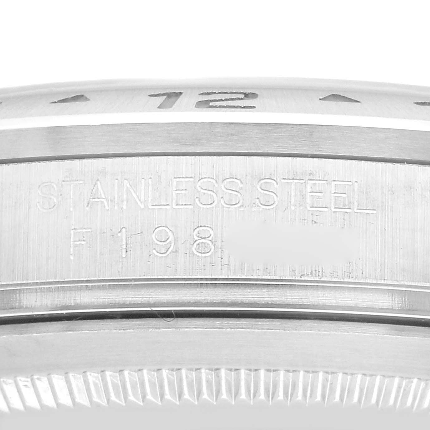 This image shows a close-up of the stainless steel case back and bezel side of a Rolex Explorer 16570 Men
s Stainless Steel Black Dial 16570 Men
s Stainless Steel Black Dial watch.