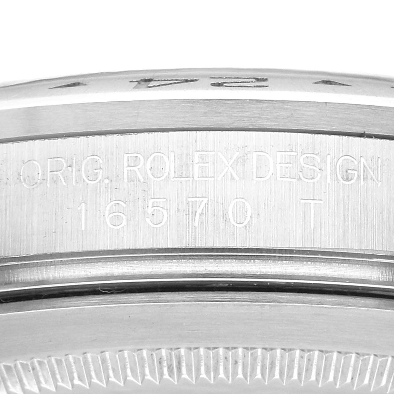 The image shows a close-up of the side of a Rolex Explorer 16570 Men
s Stainless Steel Black Dial 16570 Men
s Stainless Steel Black Dial watch, highlighting the model number "16570" and "Orig. Rolex Design" engraving.