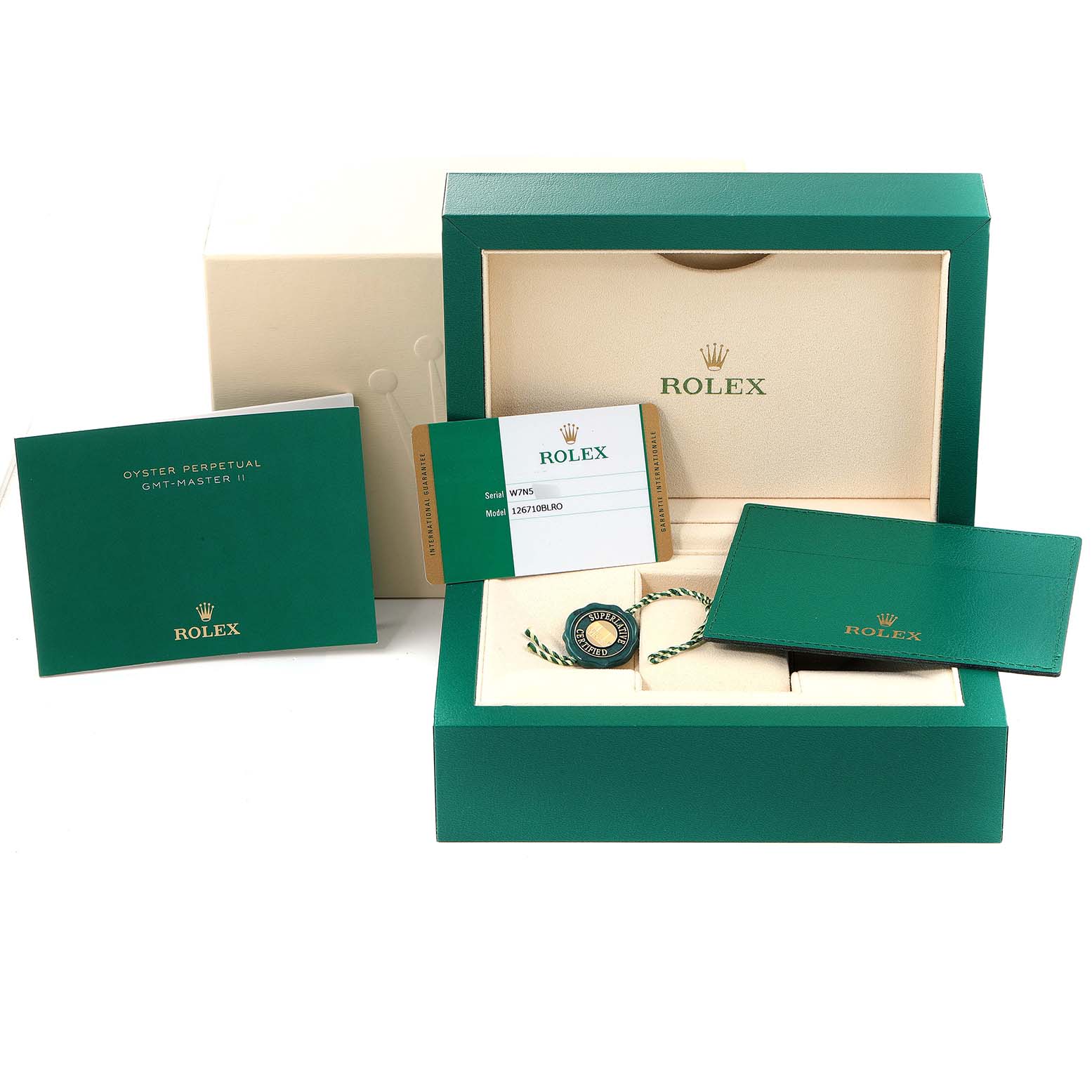 This image shows the packaging, box, warranty card, and accessories of the Rolex GMT-Master 126710 Men
s Stainless Steel Black Dial 126710 Men
s Stainless Steel Black Dial model.