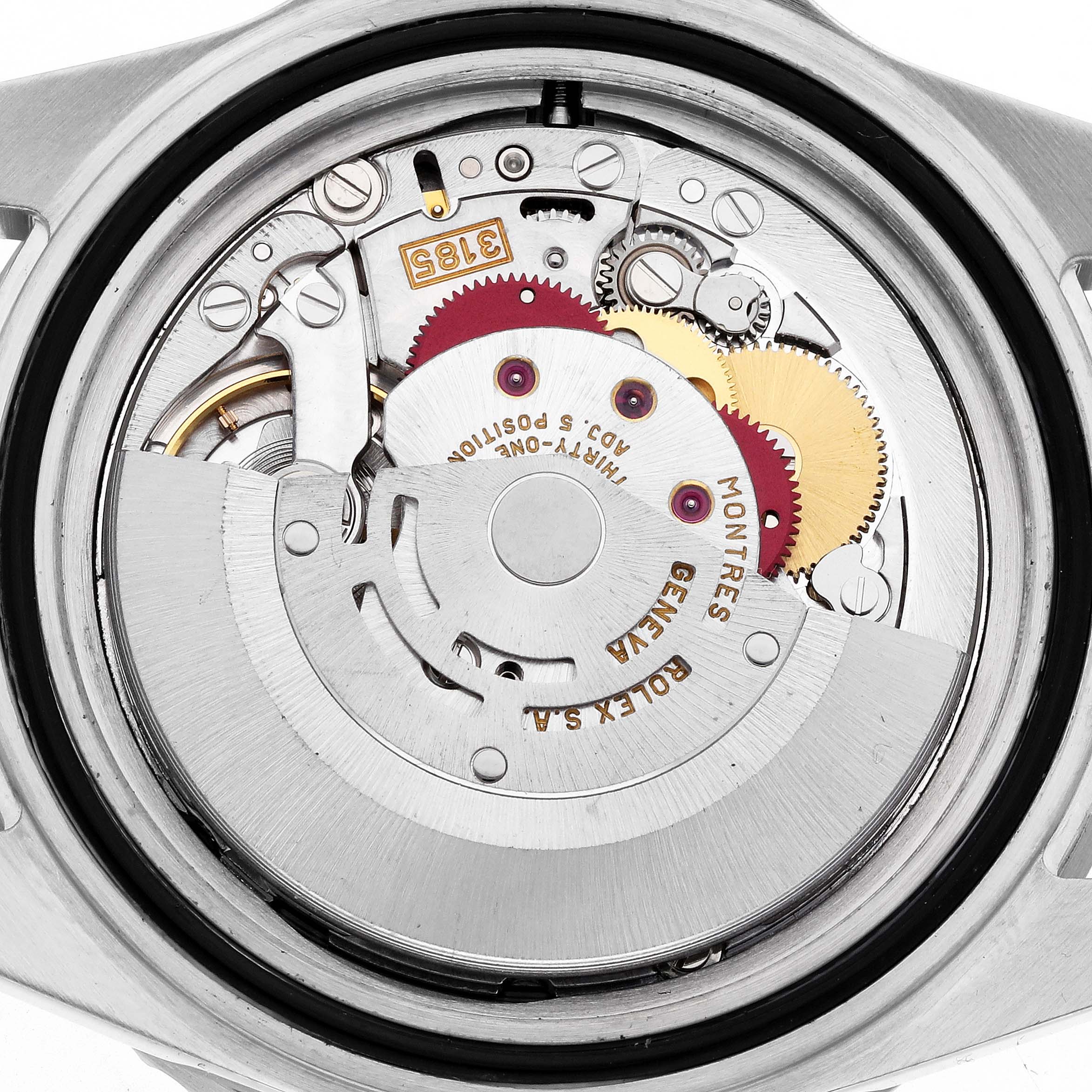 The image shows the movement of a Rolex GMT-Master 16710 Men's Stainless Steel Black Dial watch, including gears and the rotor, from a back view angle.