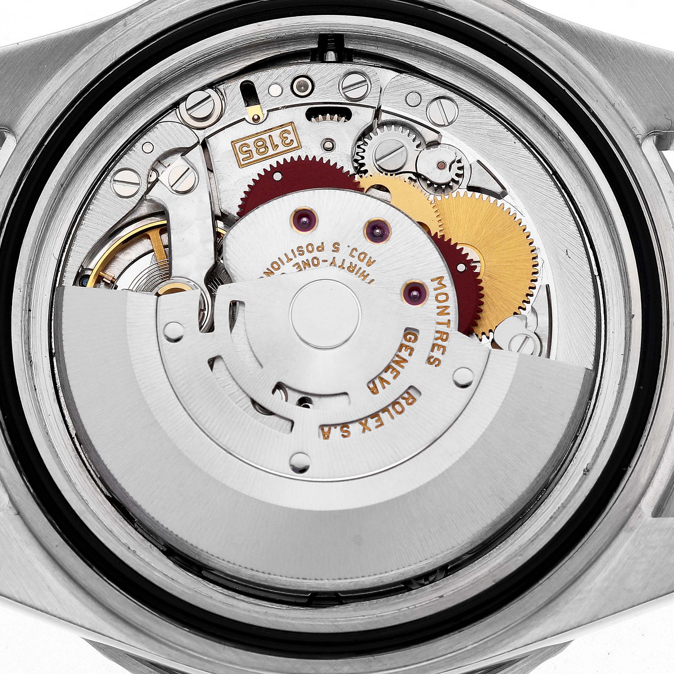 The image shows the internal mechanism of the Rolex GMT-Master 16710 Men's Stainless Steel Black Dial, displaying its movement components from a top-down angle.