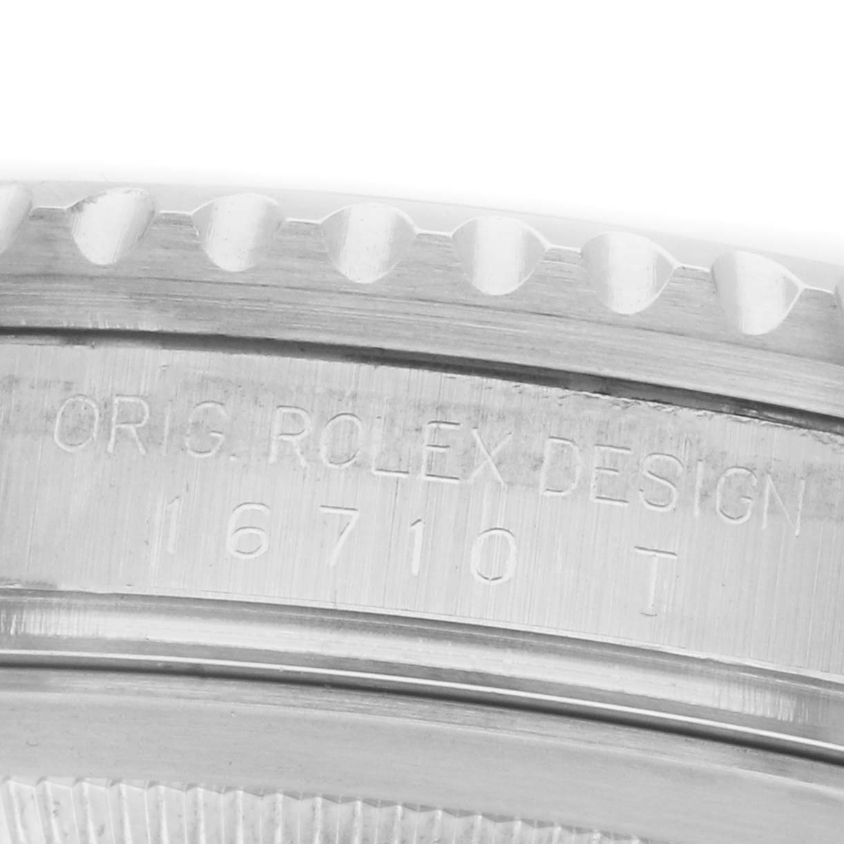 The image shows the side engraving on the case of a Rolex GMT-Master 16710 Men's Stainless Steel Black Dial, model number 16710 T.