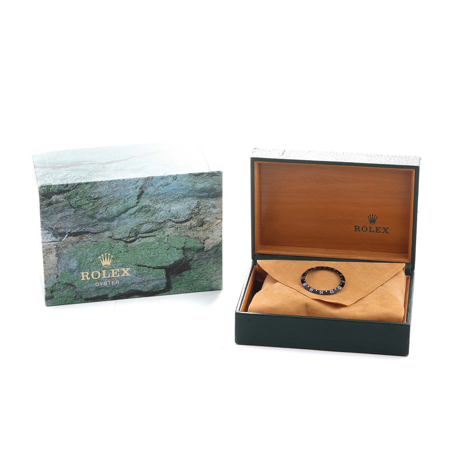 The image shows a Rolex GMT-Master 16710 Men's Stainless Steel Black Dial box, open to reveal a watch bezel on a cushion inside.