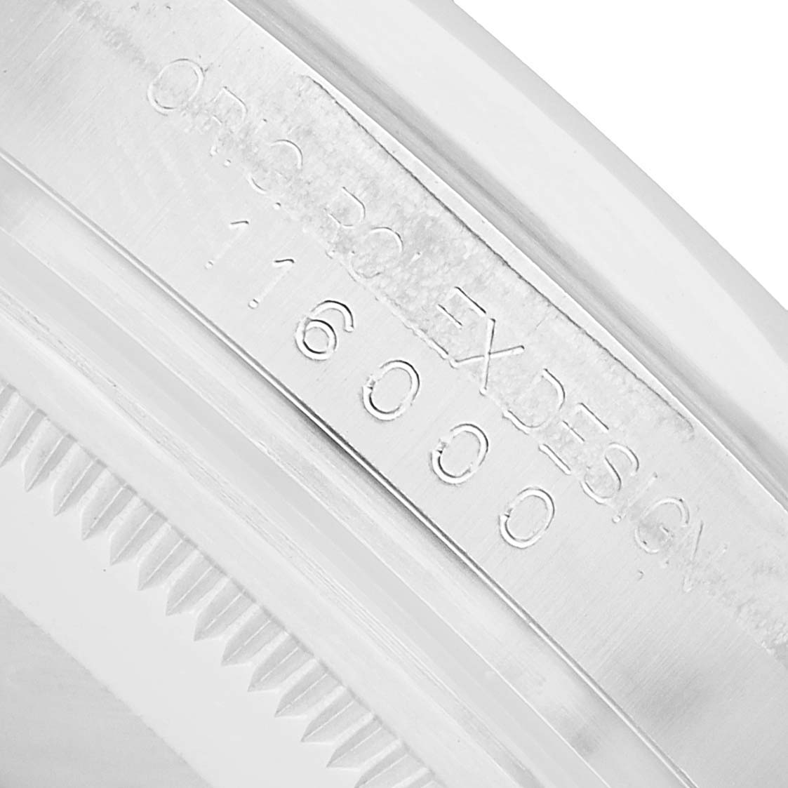 The image shows a close-up of the case side and reference engraving of a Rolex Oyster Perpetual 116000 Men's Stainless Steel Silver Dial watch.