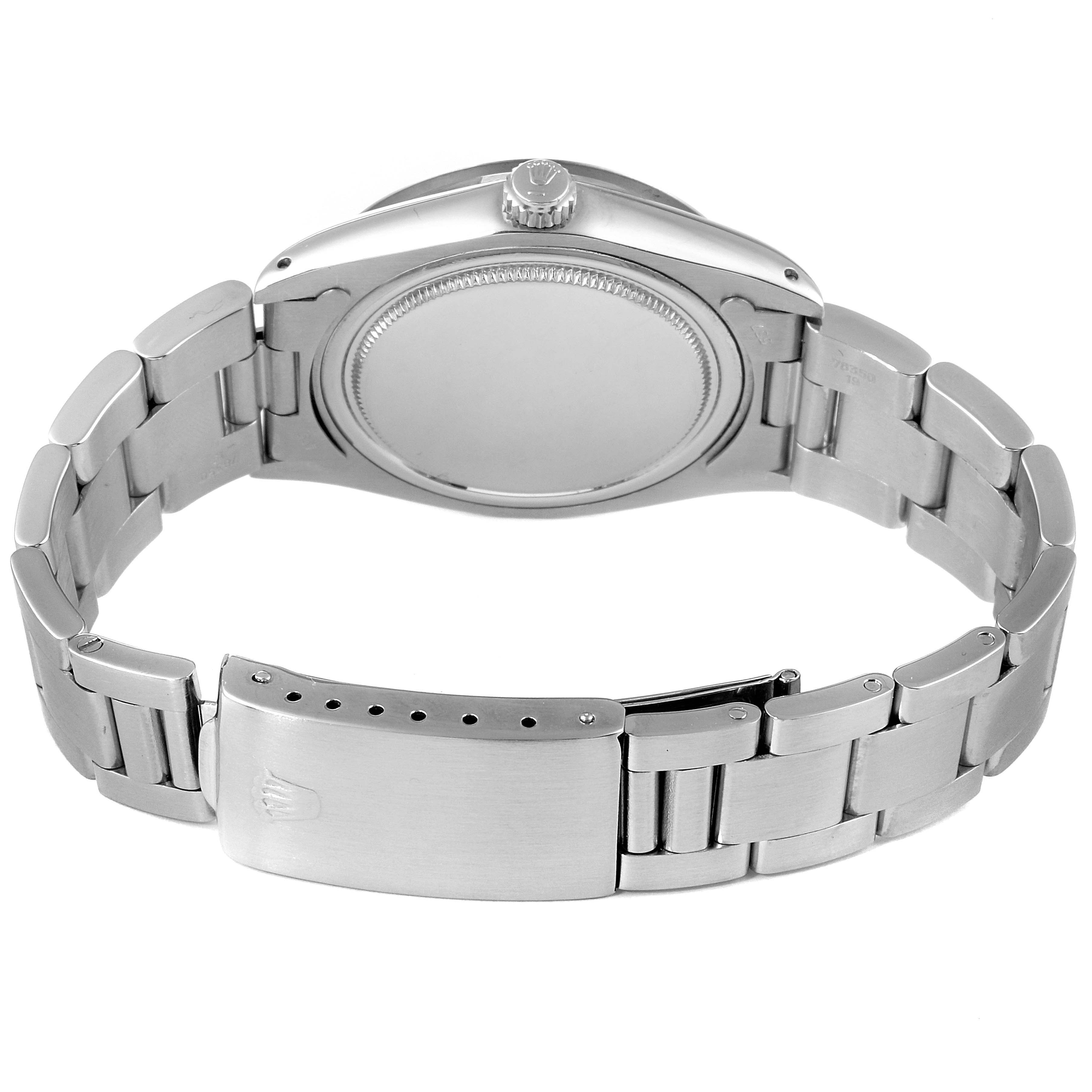 The image shows the underside and bracelet of a Rolex Vintage Collection 6694 Men's Stainless Steel Brown Dial 6694 Men's Stainless Steel Brown Dial model, highlighting the clasp and case back.