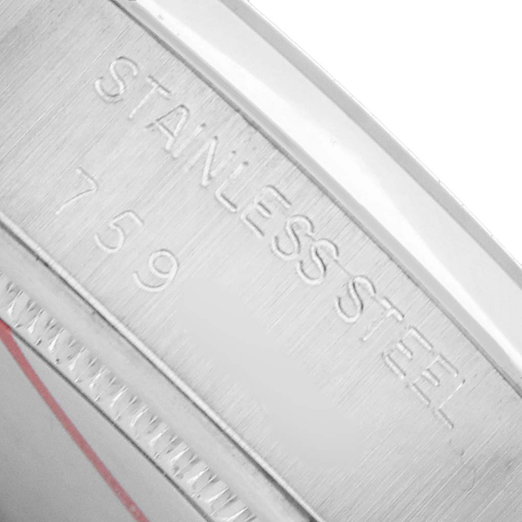 The image shows a close-up of the side, highlighting the stainless steel marking on the Rolex Vintage Collection 6694 Men's Stainless Steel Black Dial watch.