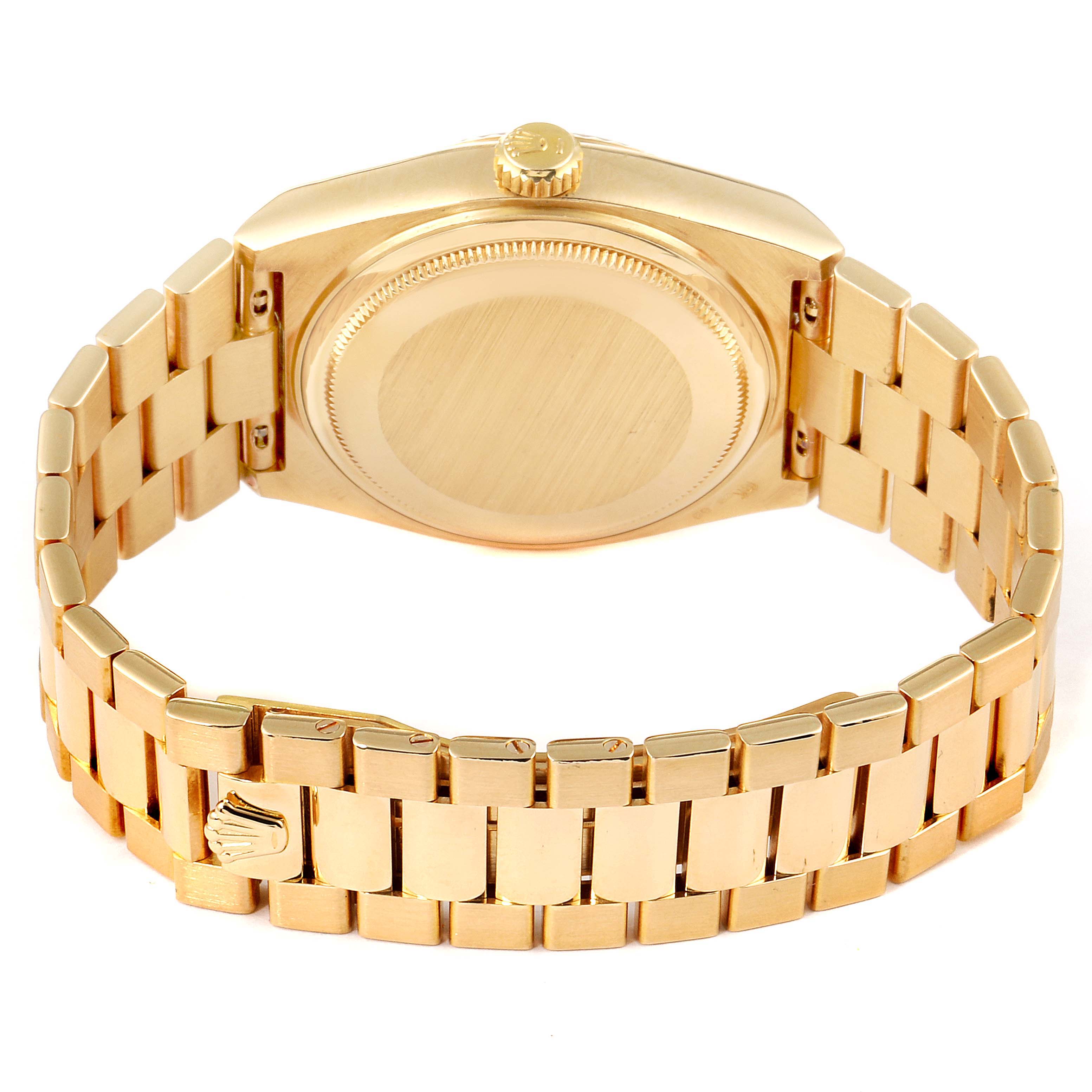 The image shows the back view of a Rolex Oysterquartz 19018 Men's Yellow Gold Champagne Dial 19018 Men's Yellow Gold Champagne Dial watch, highlighting the case back and the gold bracelet with the clasp.