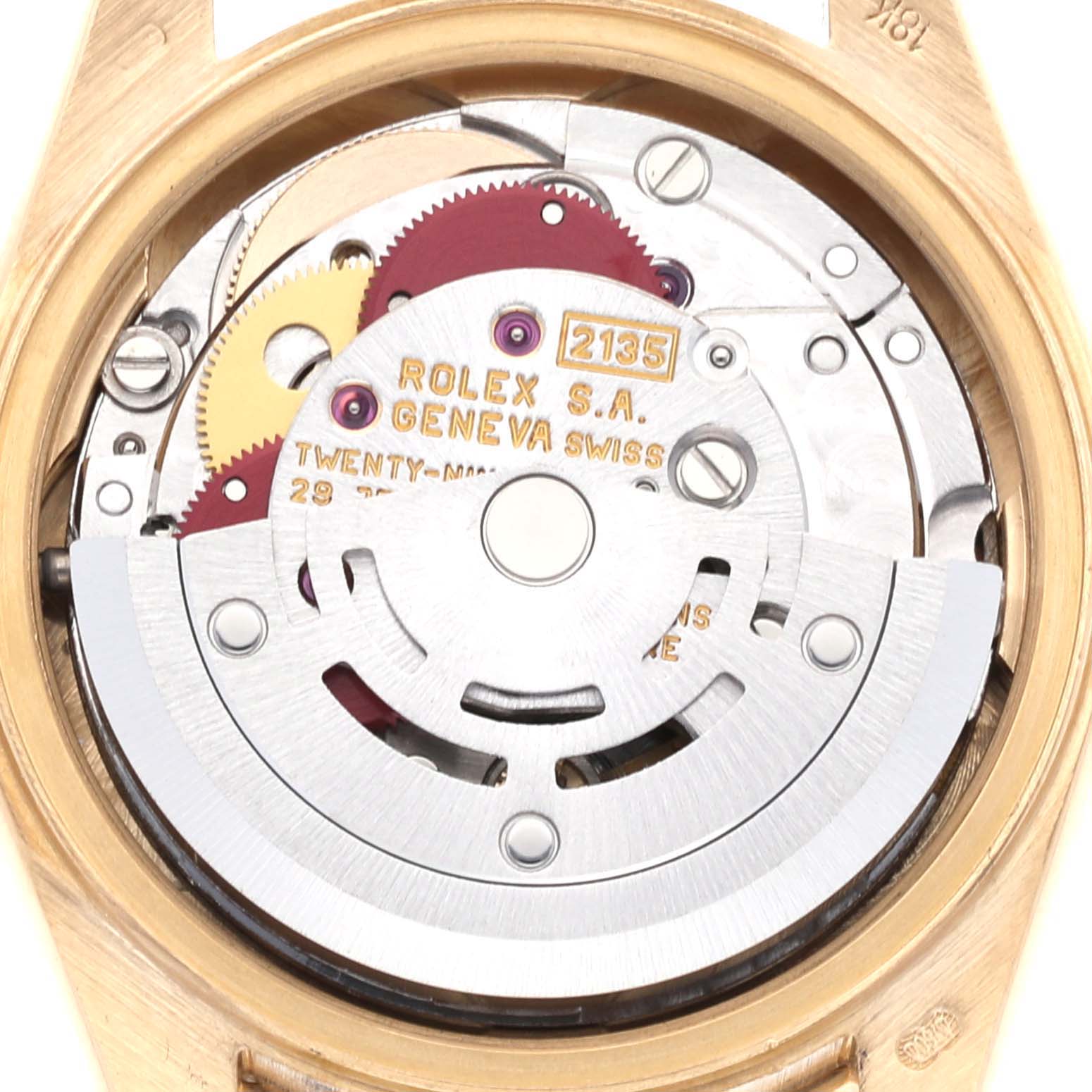 This image shows the internal mechanism of a Rolex President 69138G Women
s Yellow Gold Champagne Dial 69138G Women
s Yellow Gold Champagne Dial model watch, highlighting its movement and components.