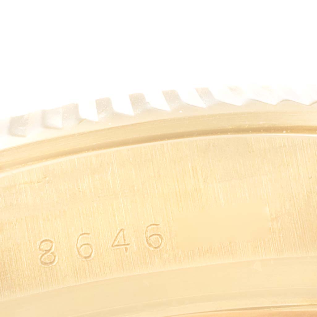 The image shows a close-up of the bezel and part of the case of a Rolex President 18038 Men's Yellow Gold Champagne Dial 18038 Men's Yellow Gold Champagne Dial model watch with the number 8646 engraved.