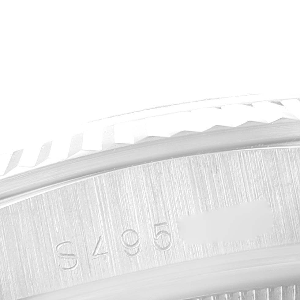 This image shows a close-up of the case and serial number engraving on a Rolex President 18239 Men
s White Gold Silver Dial 18239 Men
s White Gold Silver Dial model watch.