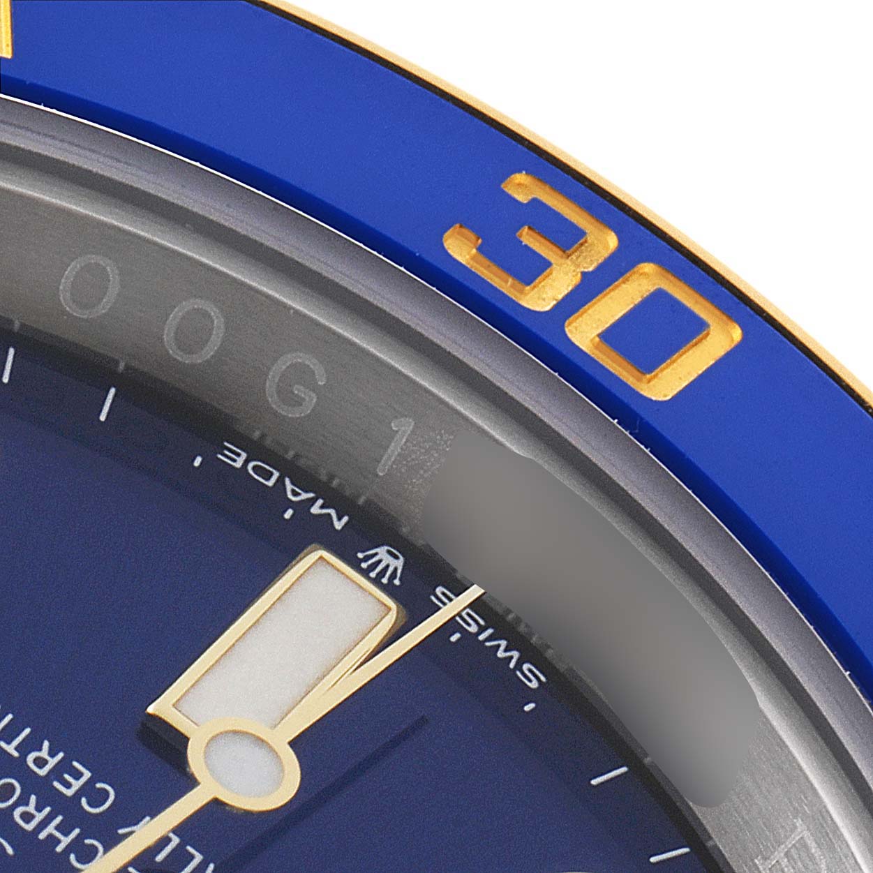 This close-up image shows the bezel and part of the dial of a Rolex Submariner 126613 Men's Steel and Gold (two tone) Blue Dial 126613 Men's Steel and Gold (two tone) Blue Dial watch, highlighting the "30" marker and a luminescent hand.