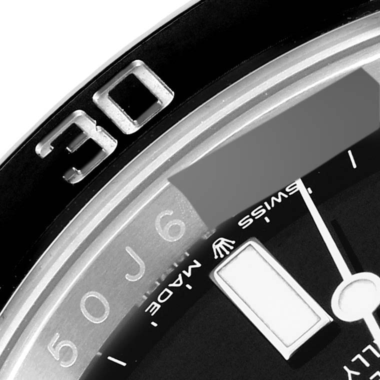 The image shows a close-up of the dial and bezel, featuring the 
30
 marker of the Rolex Submariner 126610LN Men
s Stainless Steel Black Dial 126610LN Men
s Stainless Steel Black Dial watch.