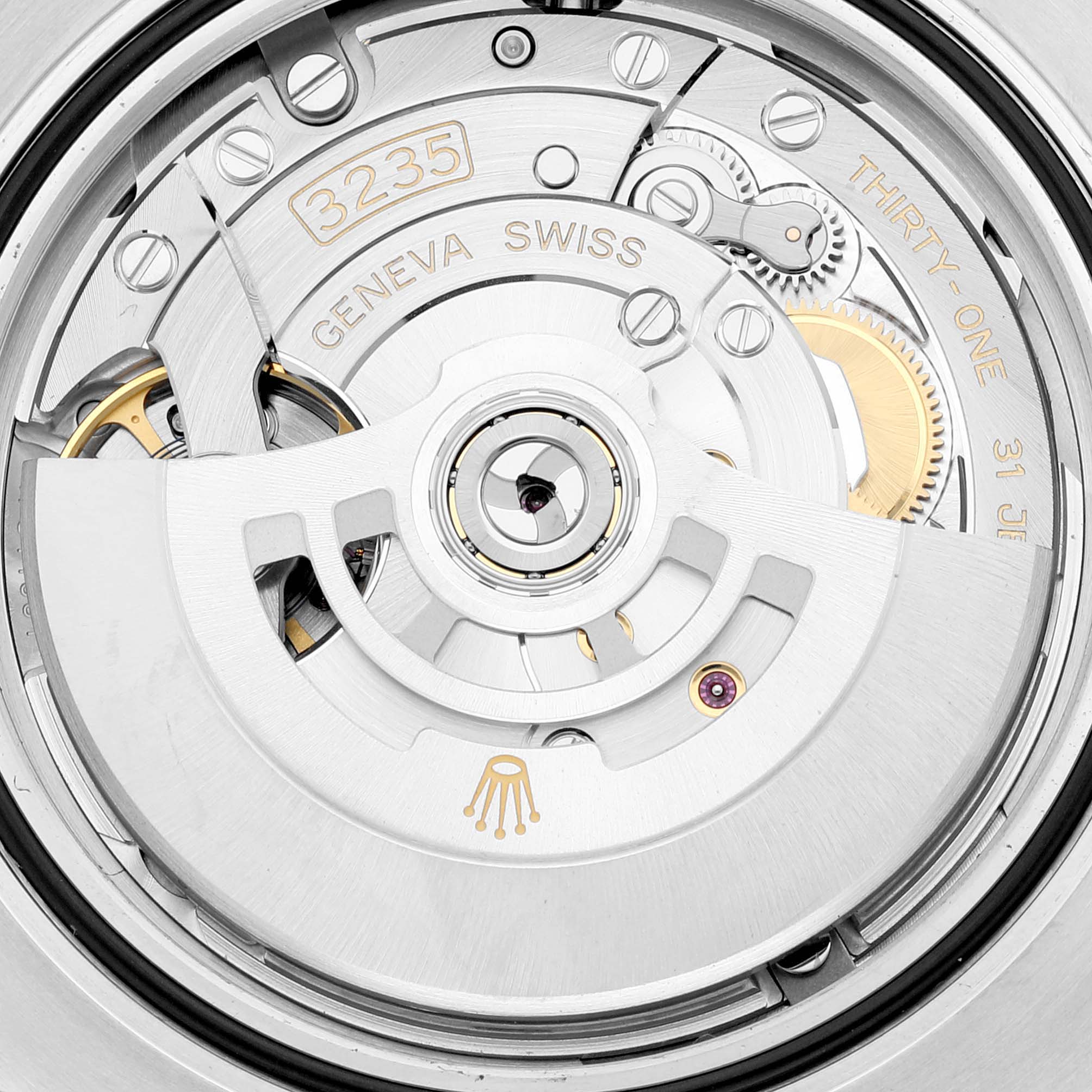 The image shows the detailed inner mechanism, or movement, of a Rolex Submariner 126610LN Men
s Stainless Steel Black Dial 126610LN Men
s Stainless Steel Black Dial watch viewed from the back.