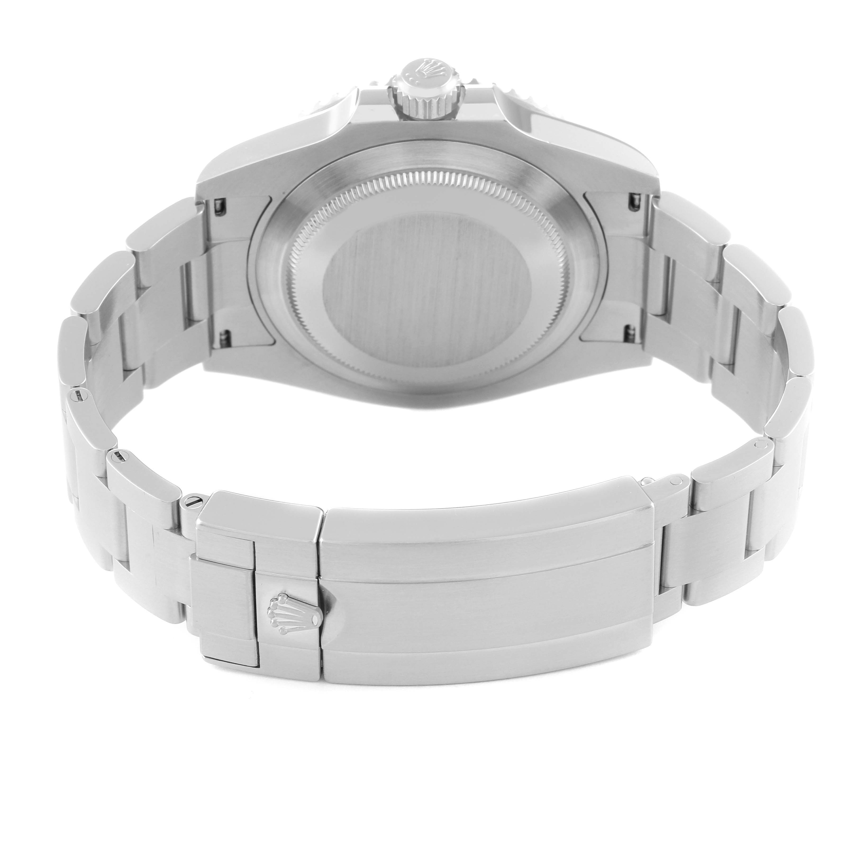 The image shows the back view of a Rolex Submariner 126610LN Men
s Stainless Steel Black Dial 126610LN Men
s Stainless Steel Black Dial watch, focusing on the case back, crown, and clasp.