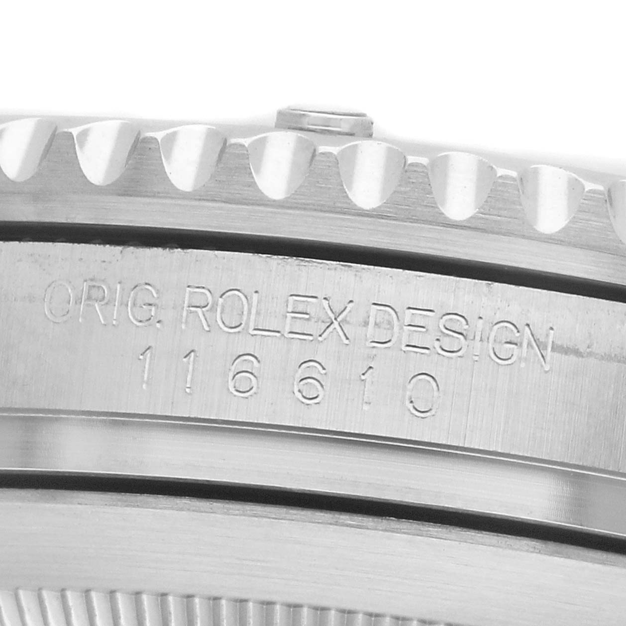 The image shows a close-up of the Rolex Submariner 116610LV Men's Stainless Steel Green Dial's side, focusing on the case with engraved text.