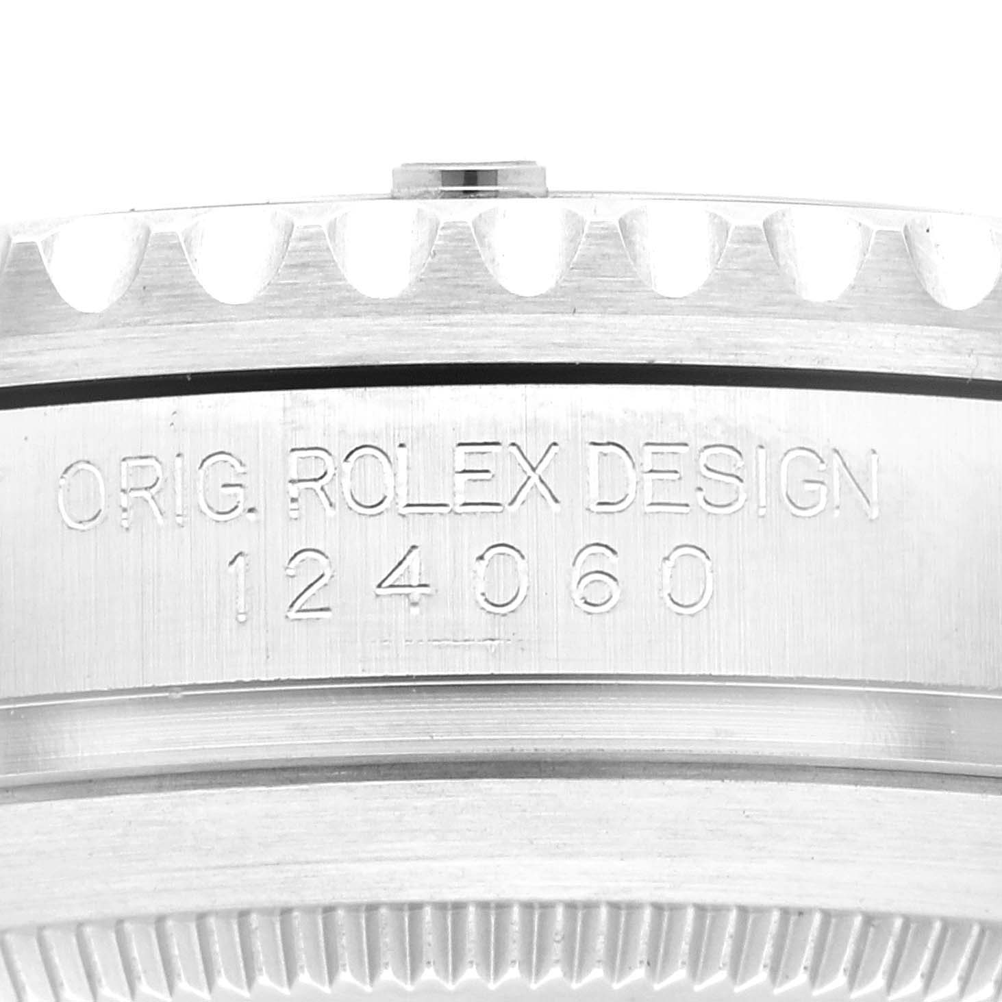 This image shows a close-up of the side of a Rolex Submariner 124060 Men
s Stainless Steel Black Dial 124060 Men
s Stainless Steel Black Dial watch case, featuring the engraved design number and part of the bezel.