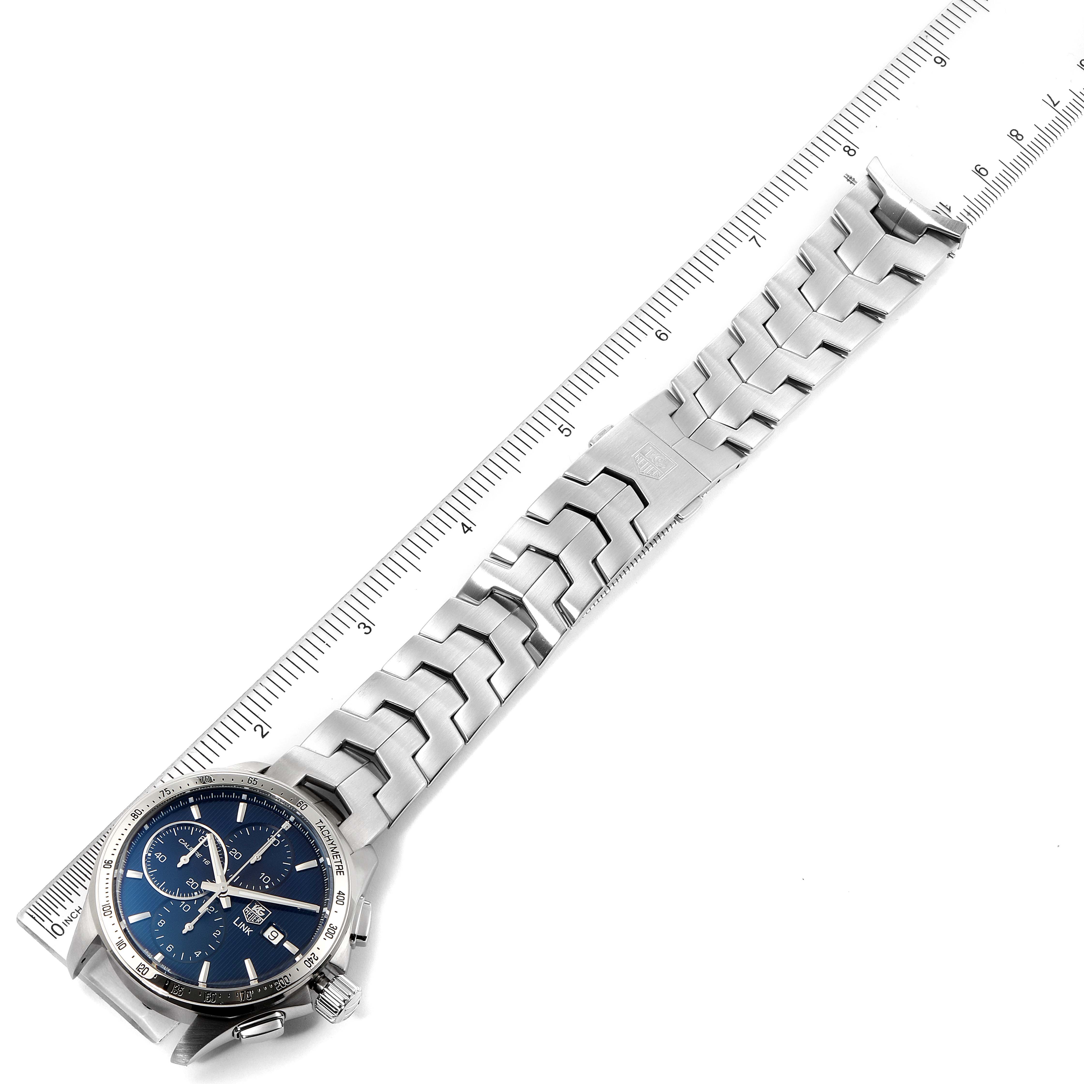 The image shows a top-down view of a Tag Heuer Link CAT2015.BA0952 Men's Stainless Steel Blue Dial CAT2015.BA0952 Men's Stainless Steel Blue Dial model watch with a metal bracelet and a blue dial.