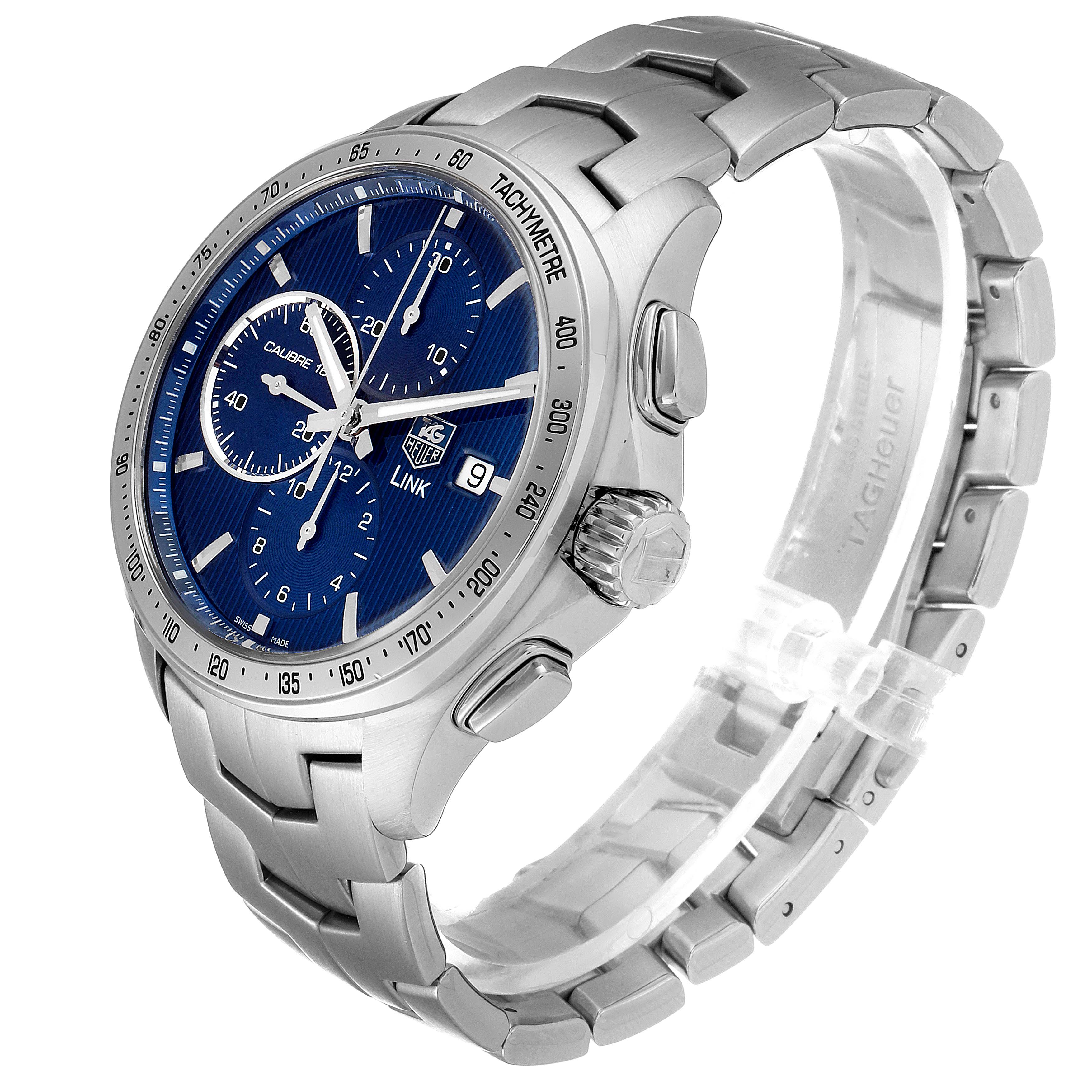 The image shows a side angle of the Tag Heuer Link CAT2015.BA0952 Men's Stainless Steel Blue Dial CAT2015.BA0952 Men's Stainless Steel Blue Dial watch displaying its face, crown, and metal bracelet.