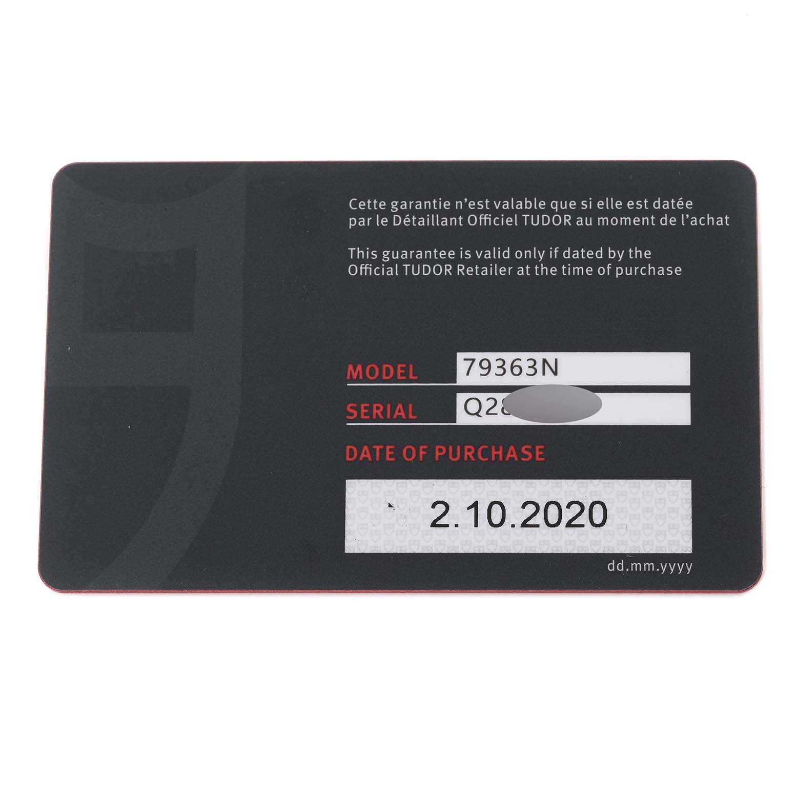 This image shows the warranty card for the Tudor Heritage Black Bay 79363N Men
s Steel and Gold (two tone) Black Dial 79363N Men
s Steel and Gold (two tone) Black Dial model, displaying the model number, serial number, and date of purchase.