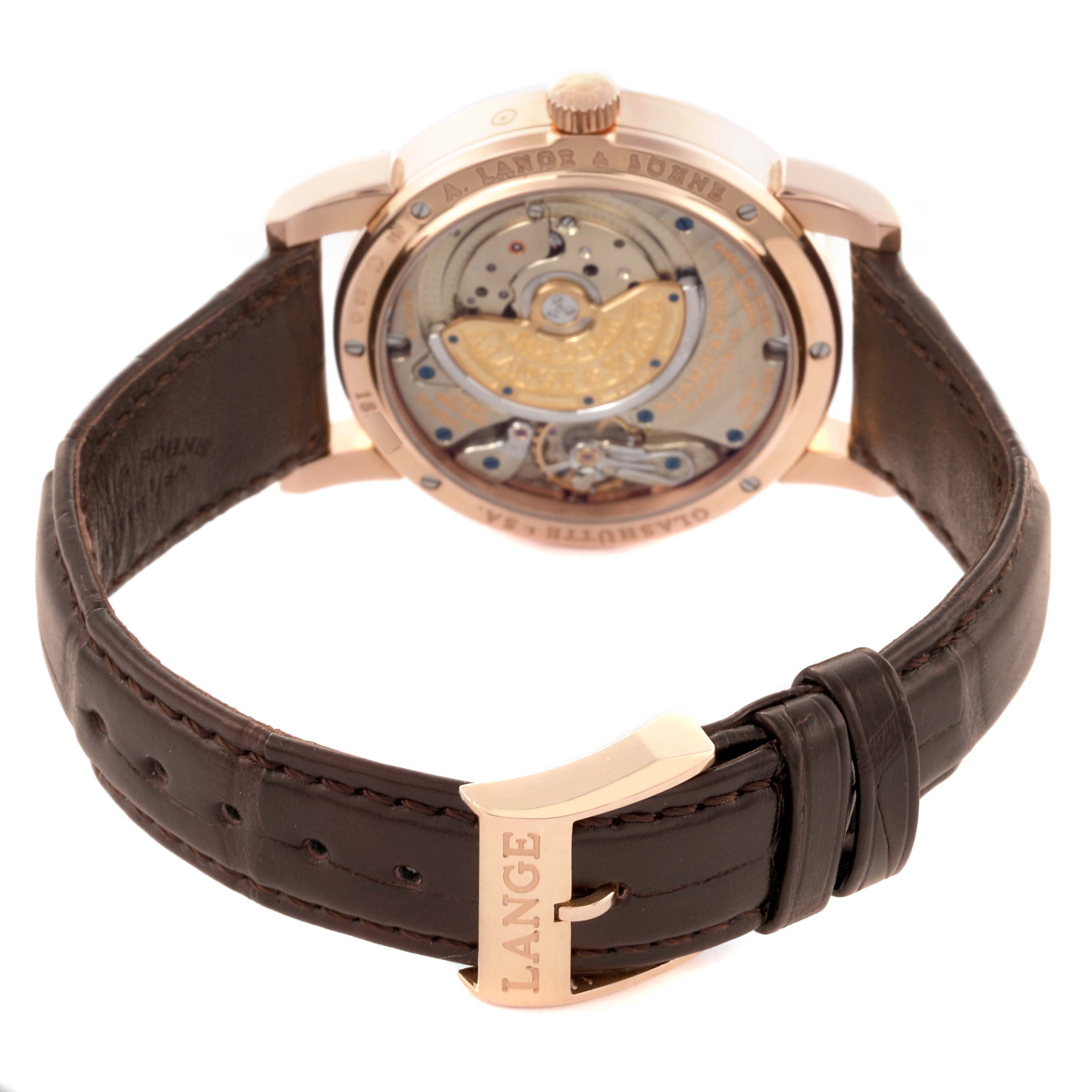 The image shows the back view of the Richard Lange by A. Lange & Söhne, highlighting the movement and leather strap.