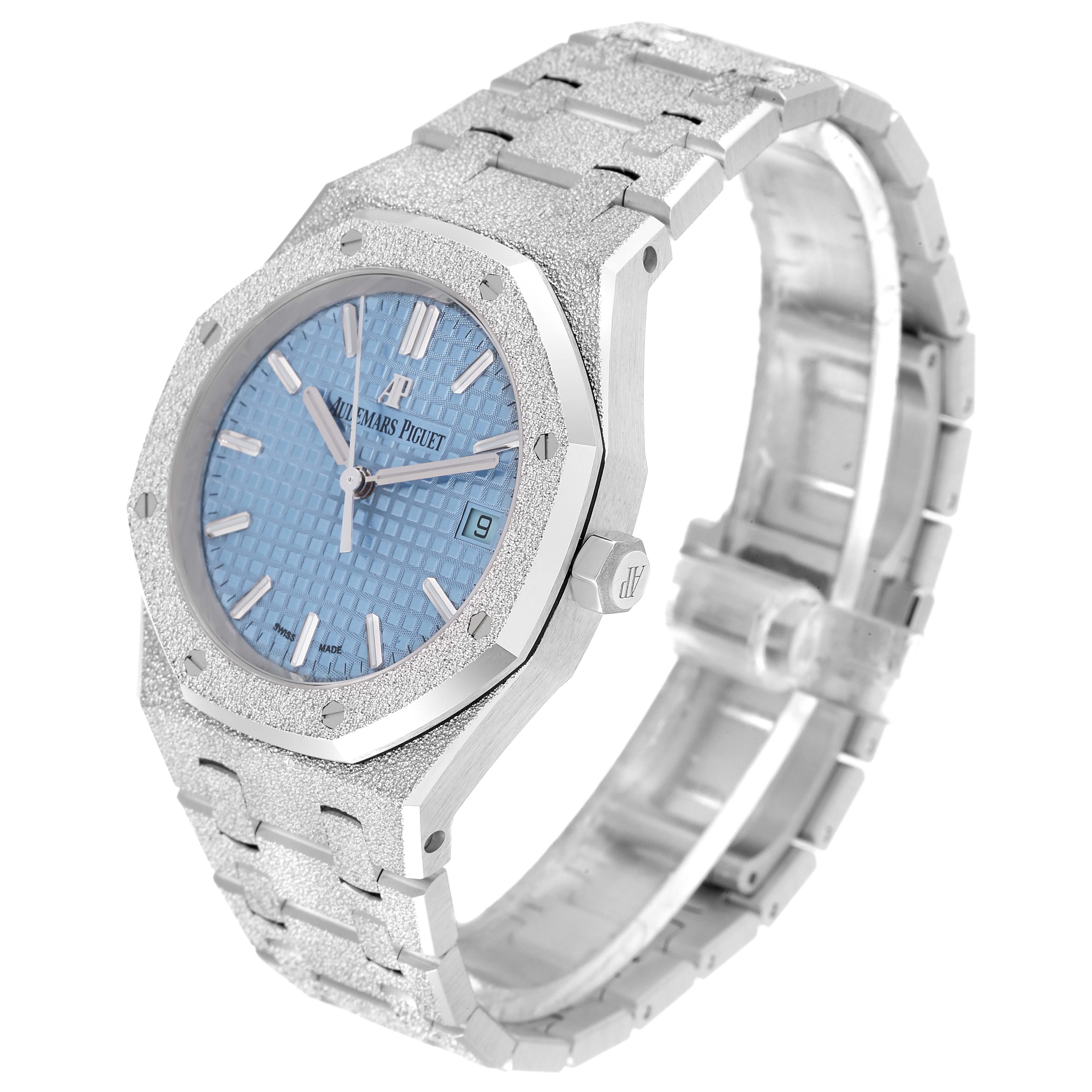 This Audemars Piguet Royal Oak 77353BC.GG.1263BC.01 Women's White Gold Blue Dial 77353BC.GG.1263BC.01 Women's White Gold Blue Dial watch is shown at a slight angle, highlighting the case, dial, bracelet, and crown.