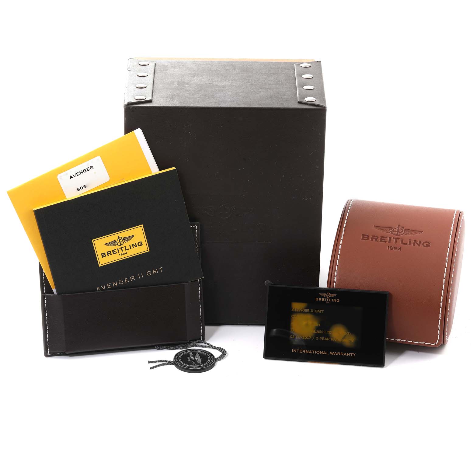 The image shows Breitling Avenger A32390 Men's Stainless Steel Black Dial A32390 Men's Stainless Steel Black Dial watch accessories, including manuals, a warranty card, a tag, a box, and a leather case.