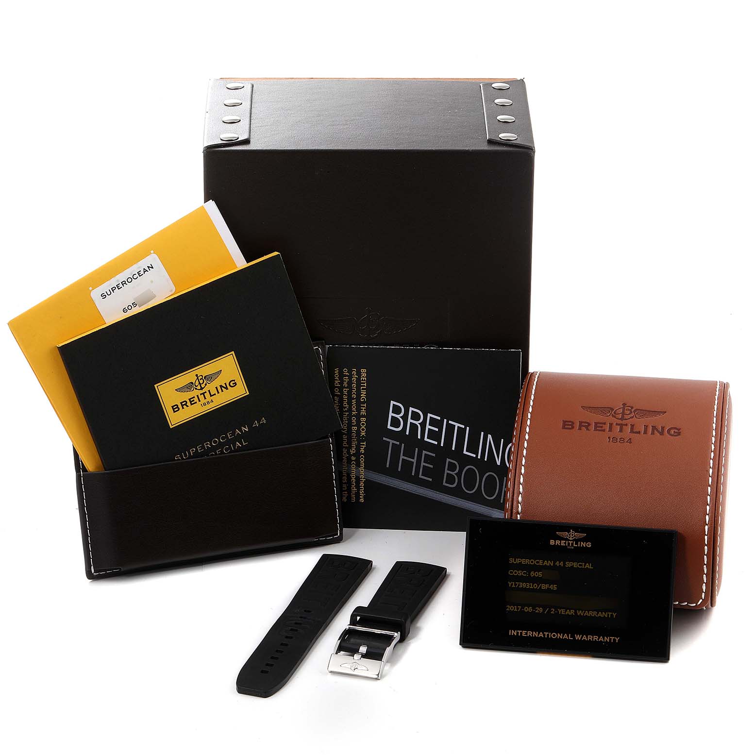The image shows Breitling Superocean Y17393 Men's Stainless Steel Black Dial Y17393 Men's Stainless Steel Black Dial watch accessories including a box, manuals, strap, warranty card, and travel case.