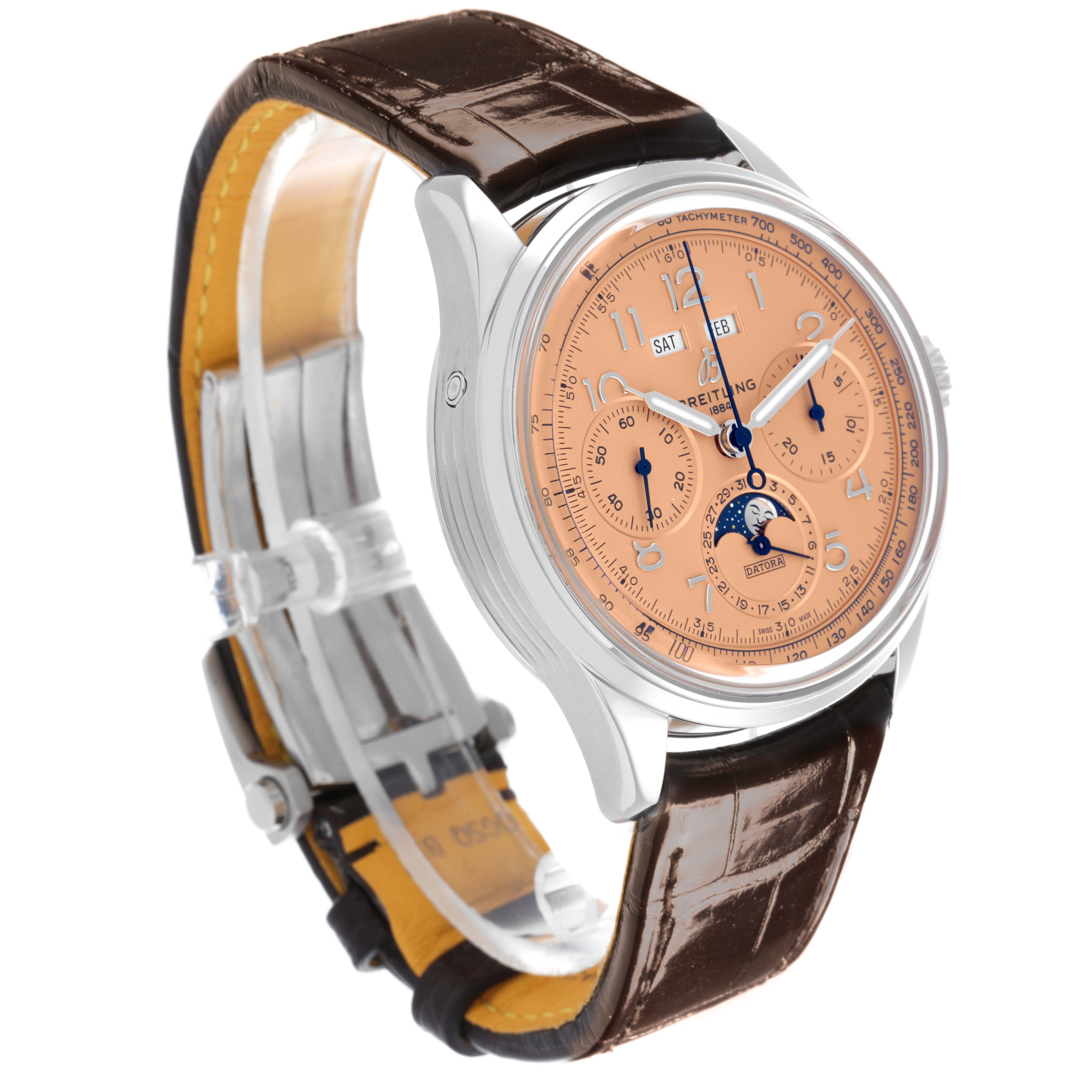 The Breitling Premier AB2510201K1P1 Men's Stainless Steel Pink Dial AB2510201K1P1 Men's Stainless Steel Pink Dial watch is shown at a three-quarter angle, highlighting its dial, case, and leather strap.