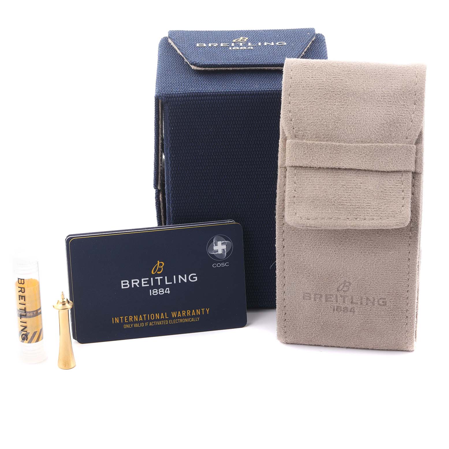 The image shows Breitling Premier AB2510201K1P1 Men's Stainless Steel Pink Dial AB2510201K1P1 Men's Stainless Steel Pink Dial watch packaging, warranty card, and accessories from a front angle.