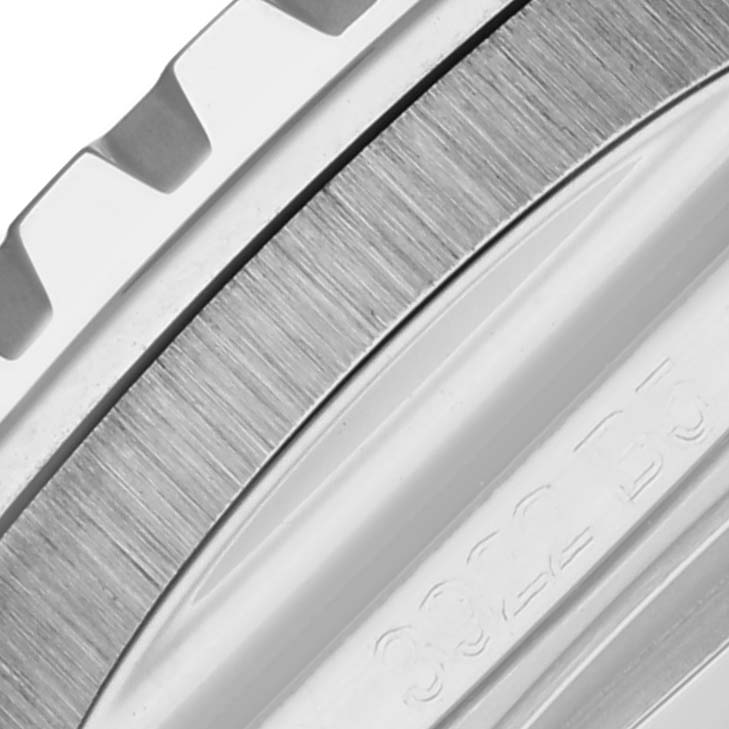 This close-up image shows the side of the bezel and part of the case of a Breitling Superocean A17375A71A1S1 Men's Stainless Steel White Dial A17375A71A1S1 Men's Stainless Steel White Dial watch.
