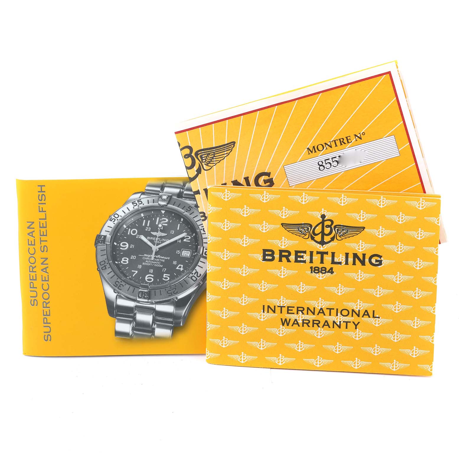 The image shows the Breitling Superocean A17360 Men's Stainless Steel Black Dial A17360 Men's Stainless Steel Black Dial watch manual, international warranty card, and a registration booklet.