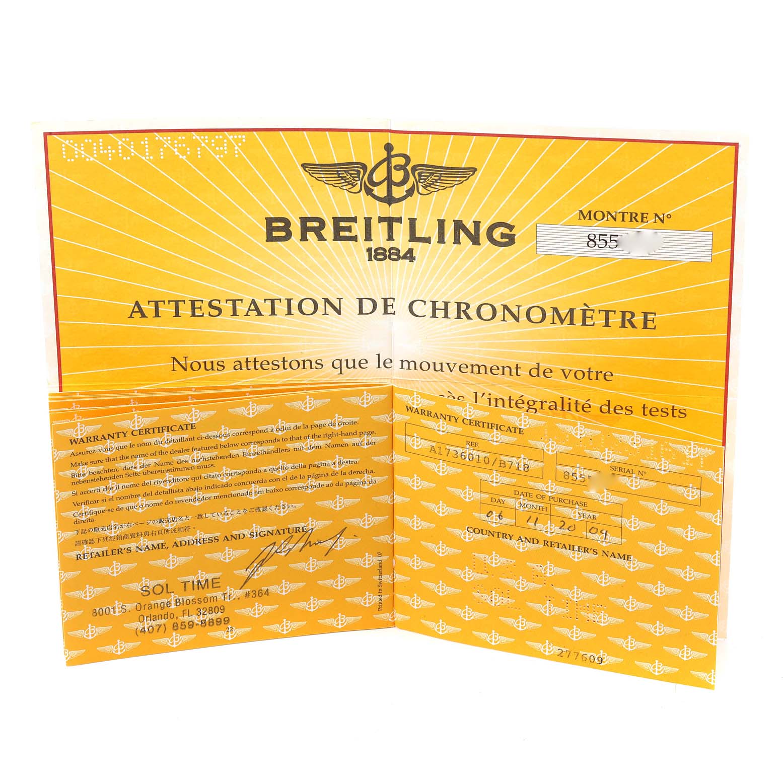 The image shows an angled view of the warranty certificate and chronometer certification for a Breitling Superocean A17360 Men's Stainless Steel Black Dial A17360 Men's Stainless Steel Black Dial watch.