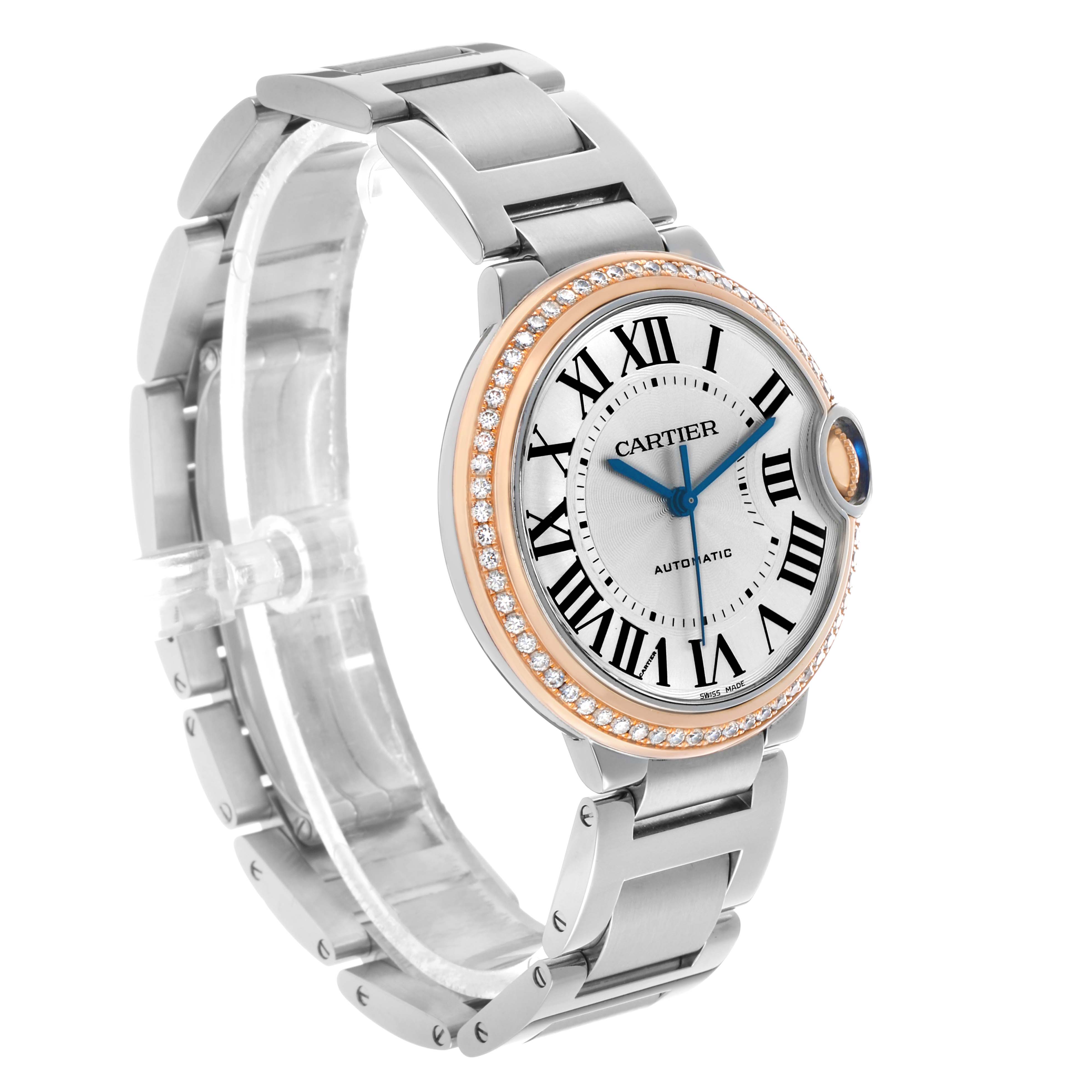 The Cartier Ballon Bleu WE902081 Women's Steel and Gold (two tone) Silver Dial watch is angled to show the face, bezel, and the bracelet from a front-left perspective.