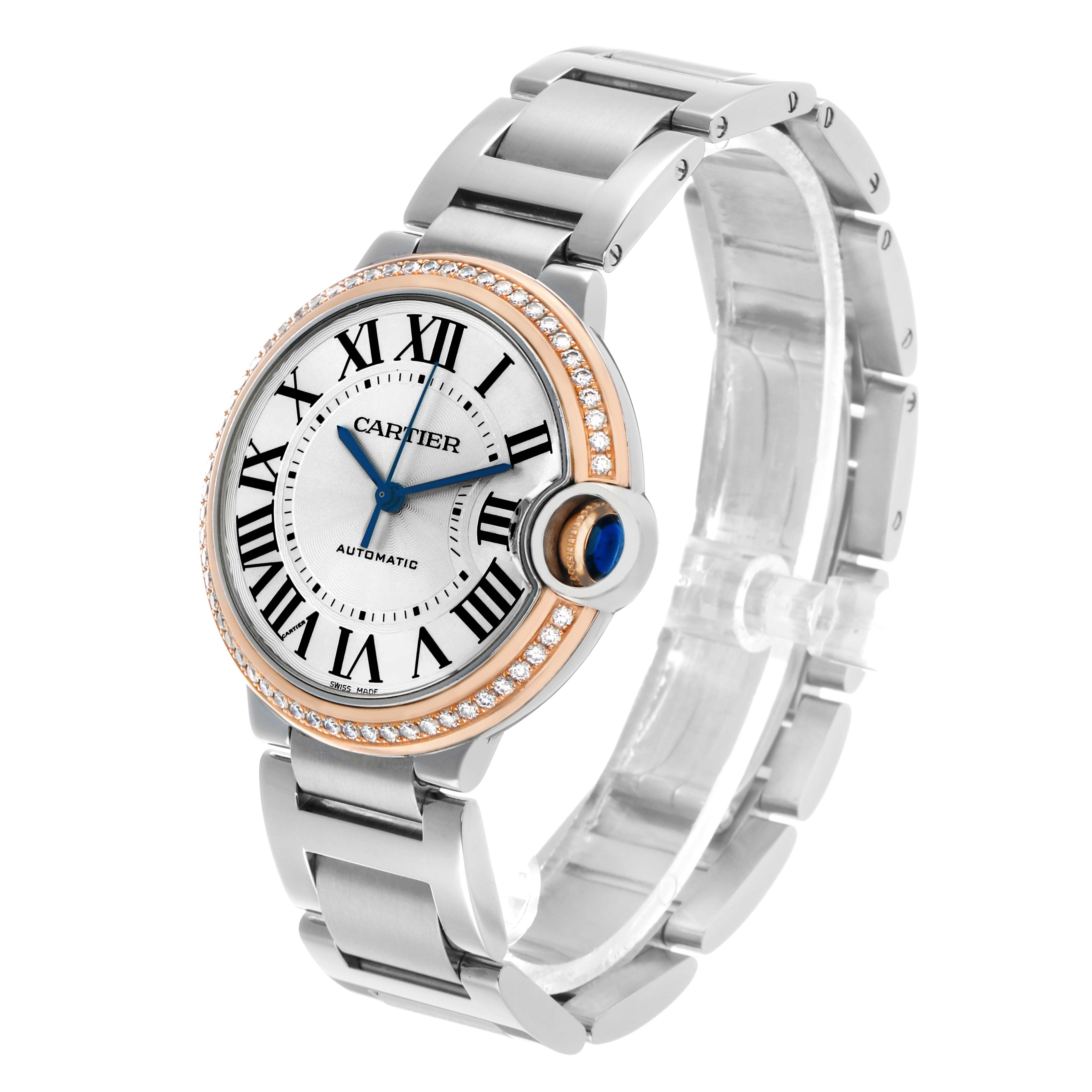 The Ballon Bleu by Cartier watch is shown at a three-quarter angle, highlighting the face, crown, and bracelet.