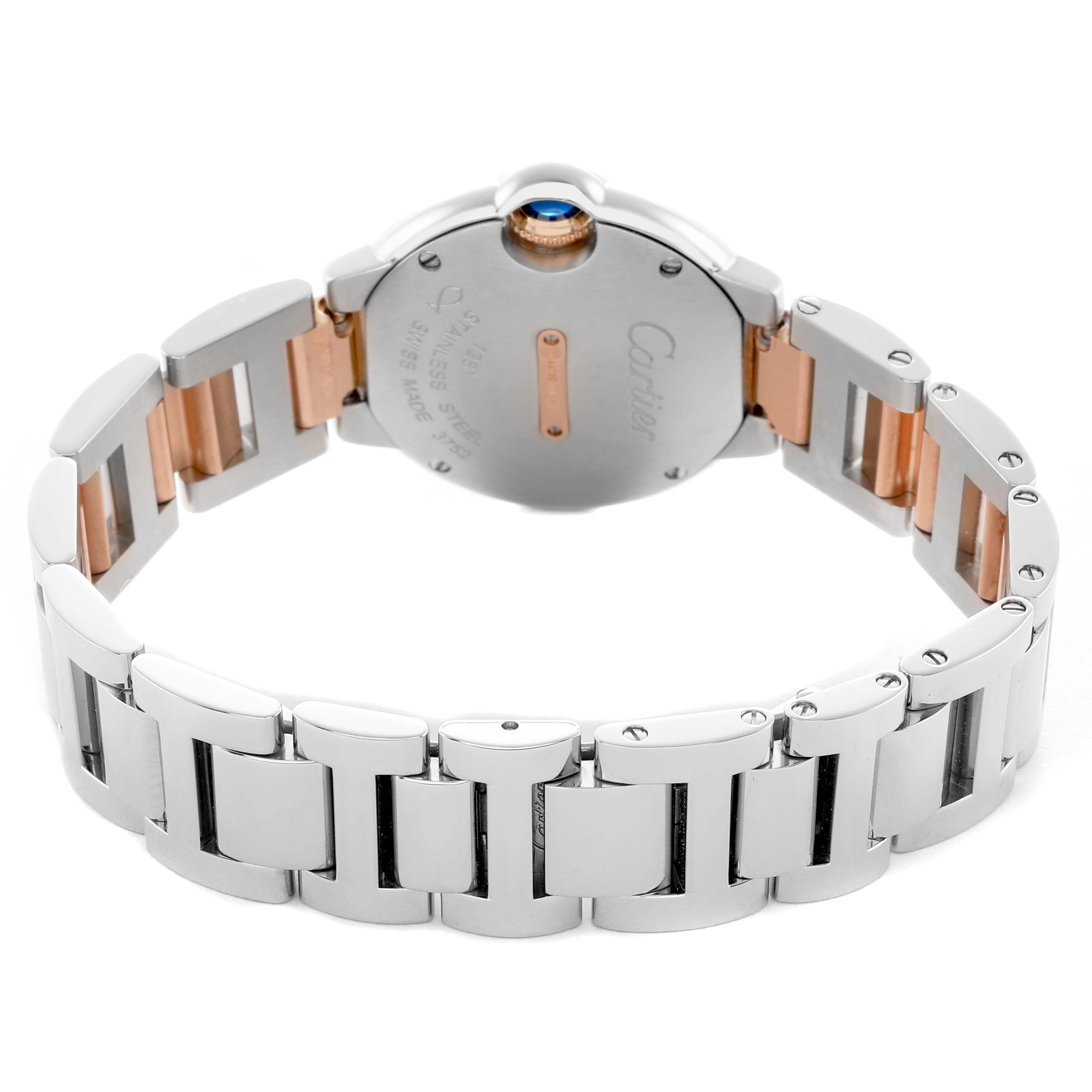 The Ballon Bleu by Cartier is shown from the back, highlighting the metal bracelet and clasp, with a view of the case back.