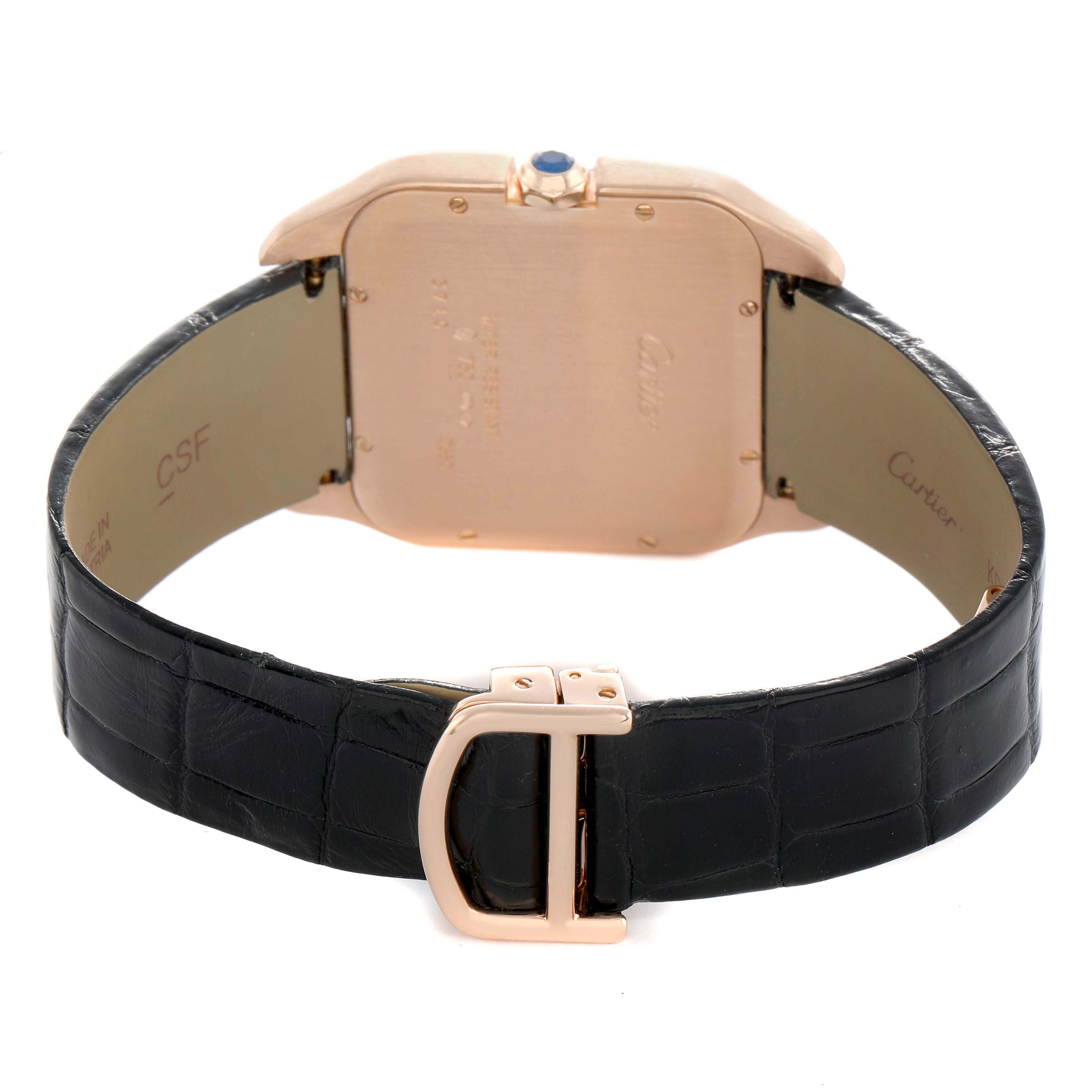 The image shows the back of the Cartier Santos Dumont W2006951 Men's Rose Gold Silver Dial watch, displaying its caseback, strap, and buckle.