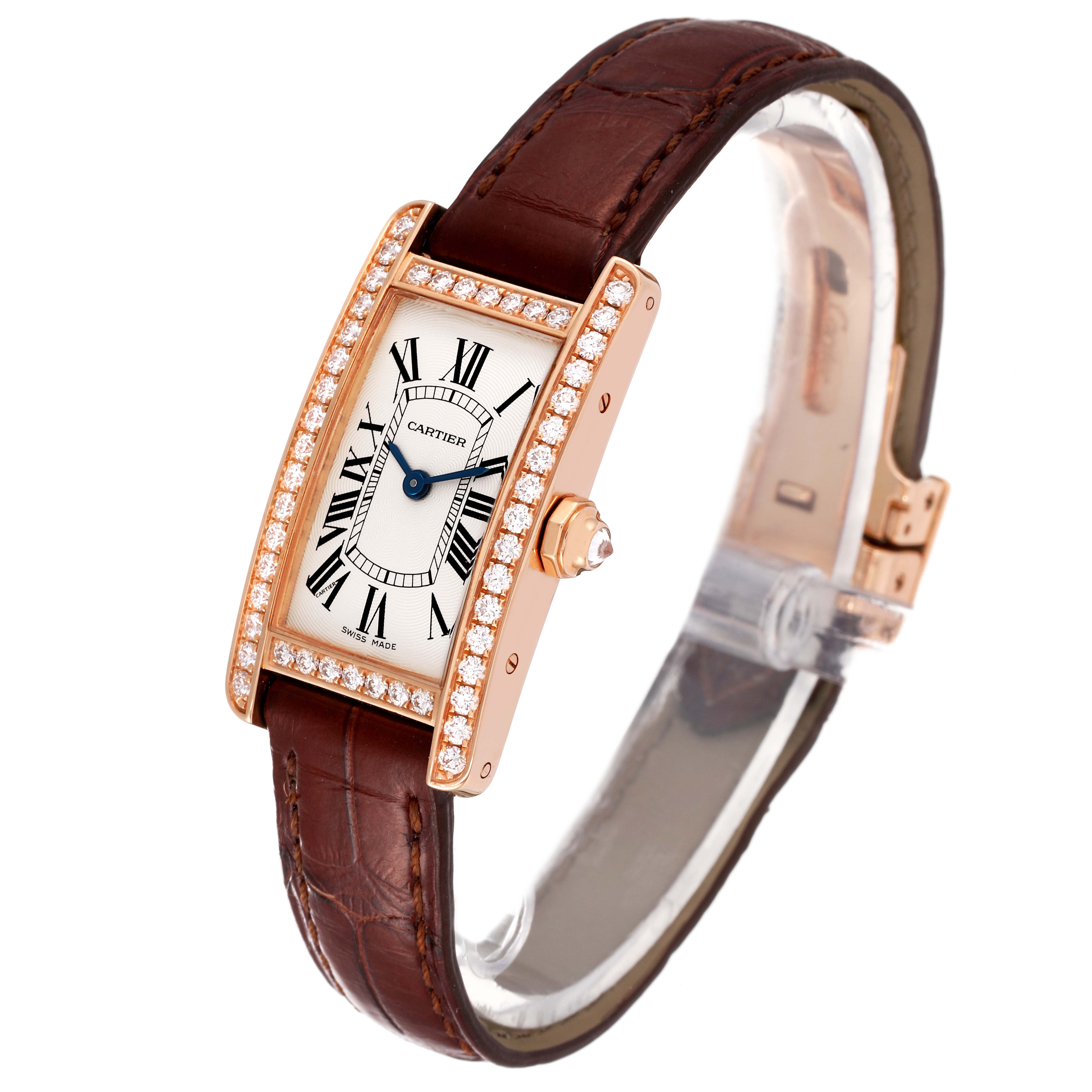 This image shows a Cartier Tank Americaine WJTA0002 Women
s Rose Gold Silver Dial WJTA0002 Women
s Rose Gold Silver Dial watch from a front angle highlighting the face, bezel, strap, and clasp.