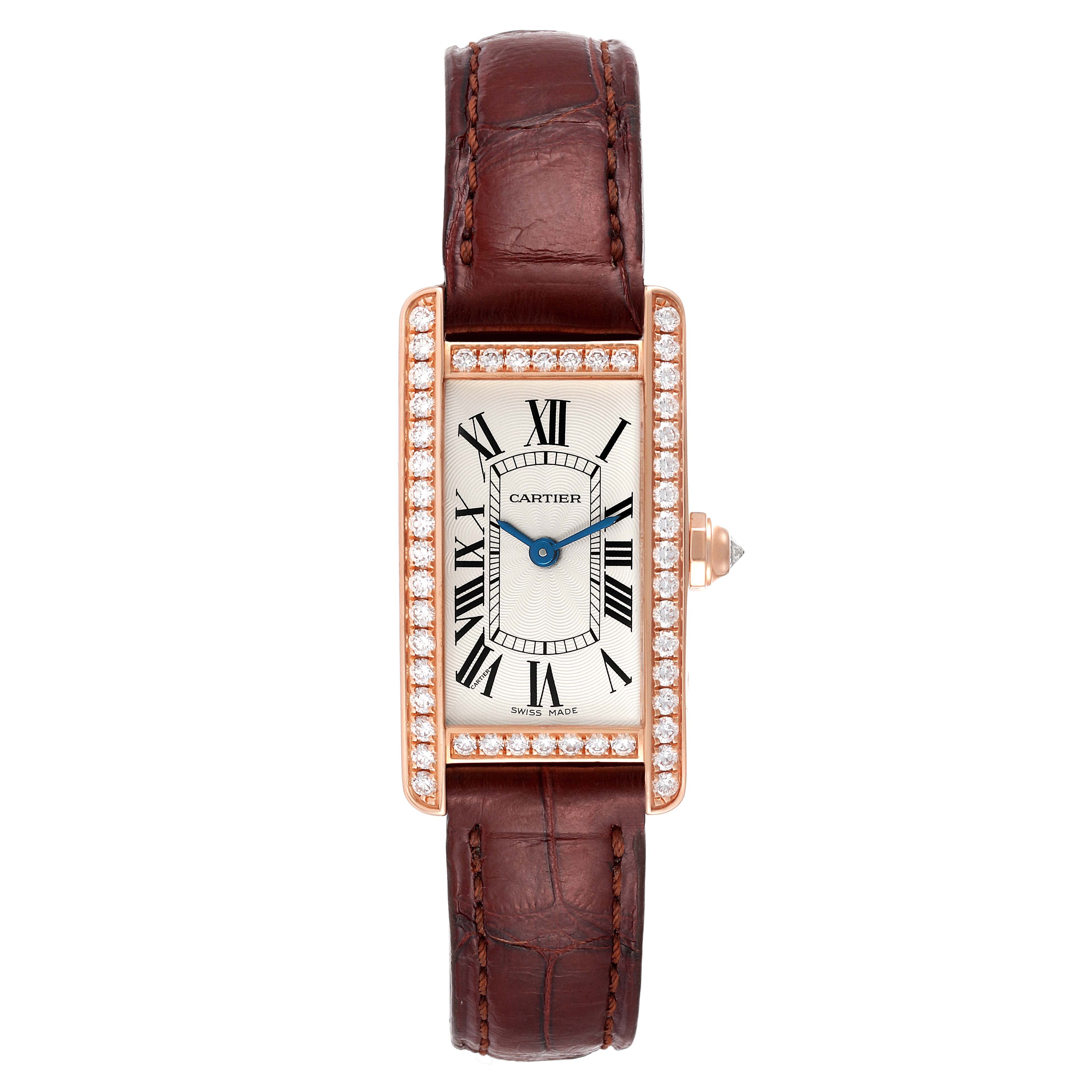 The image shows a frontal view of a Cartier Tank Américaine watch, highlighting the face, Roman numerals, diamond bezel, and leather strap.