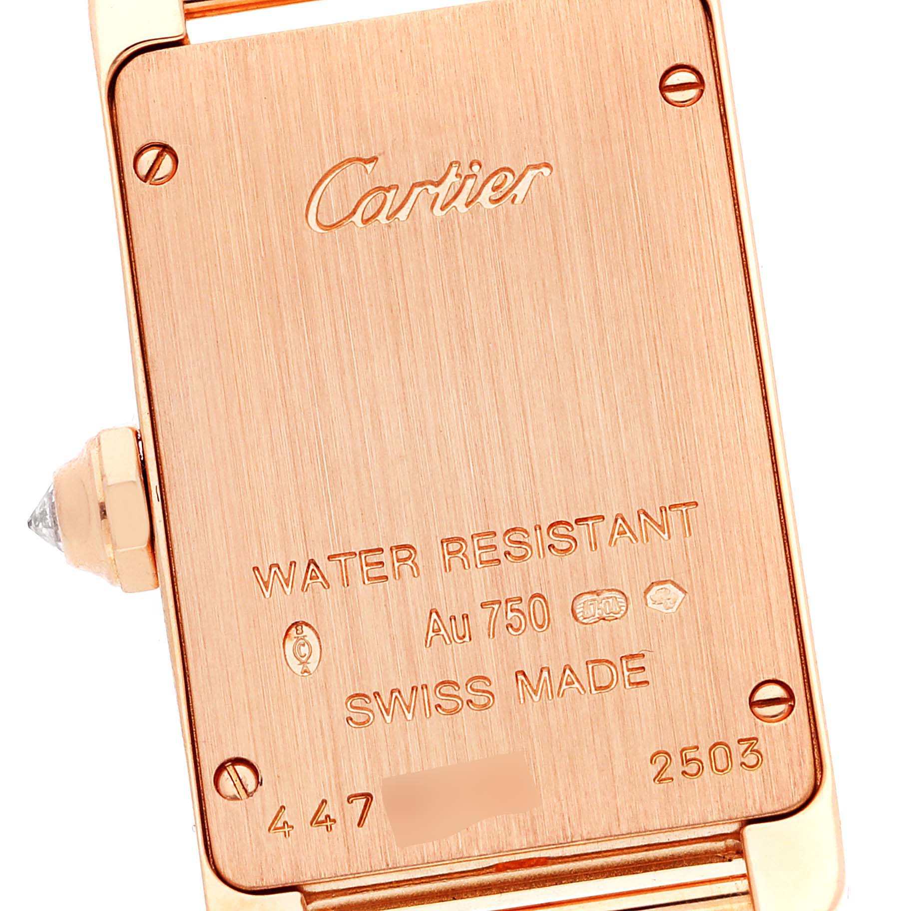 The image shows the back case of a Cartier Tank Américaine watch, displaying its engravings and water resistance.