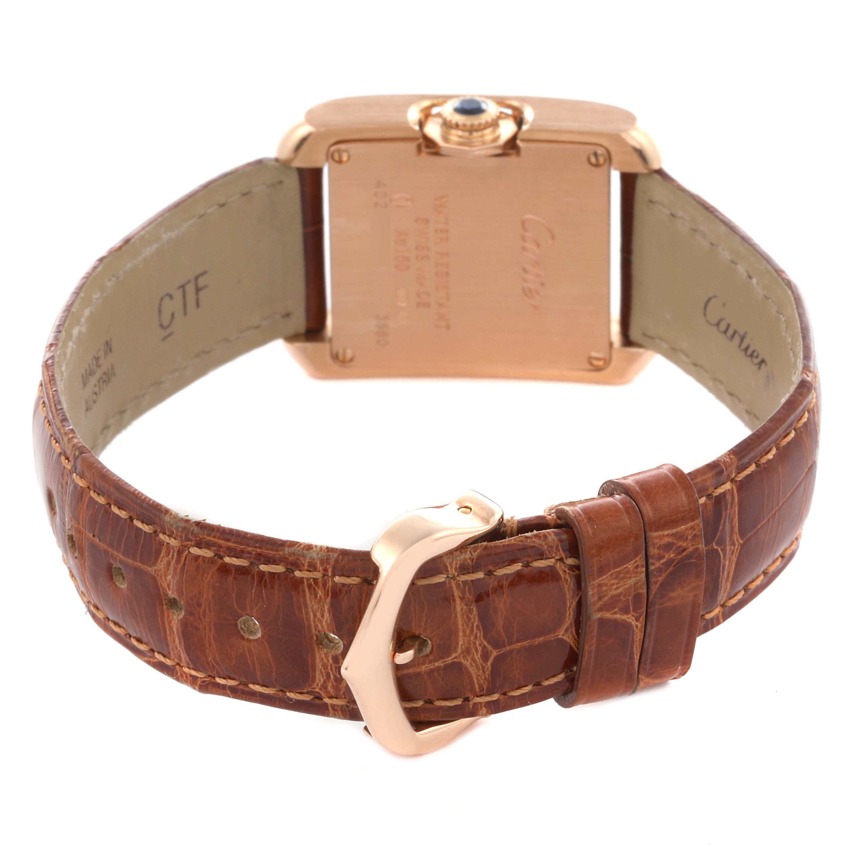 The image shows the back and brown leather strap of a Cartier Tank Anglaise WJTA0007 Women
s Rose Gold Silver Dial WJTA0007 Women
s Rose Gold Silver Dial watch.
